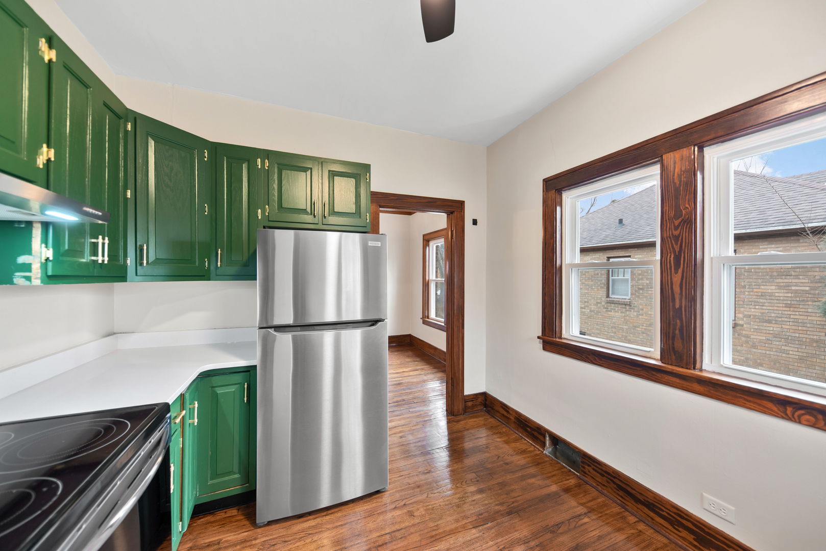 1065 South Poplar Avenue Kankakee, IL 60901 - Photo 10 of 17 a kitchen with stainless steel appliances granite countertop a refrigerator and a stove top oven