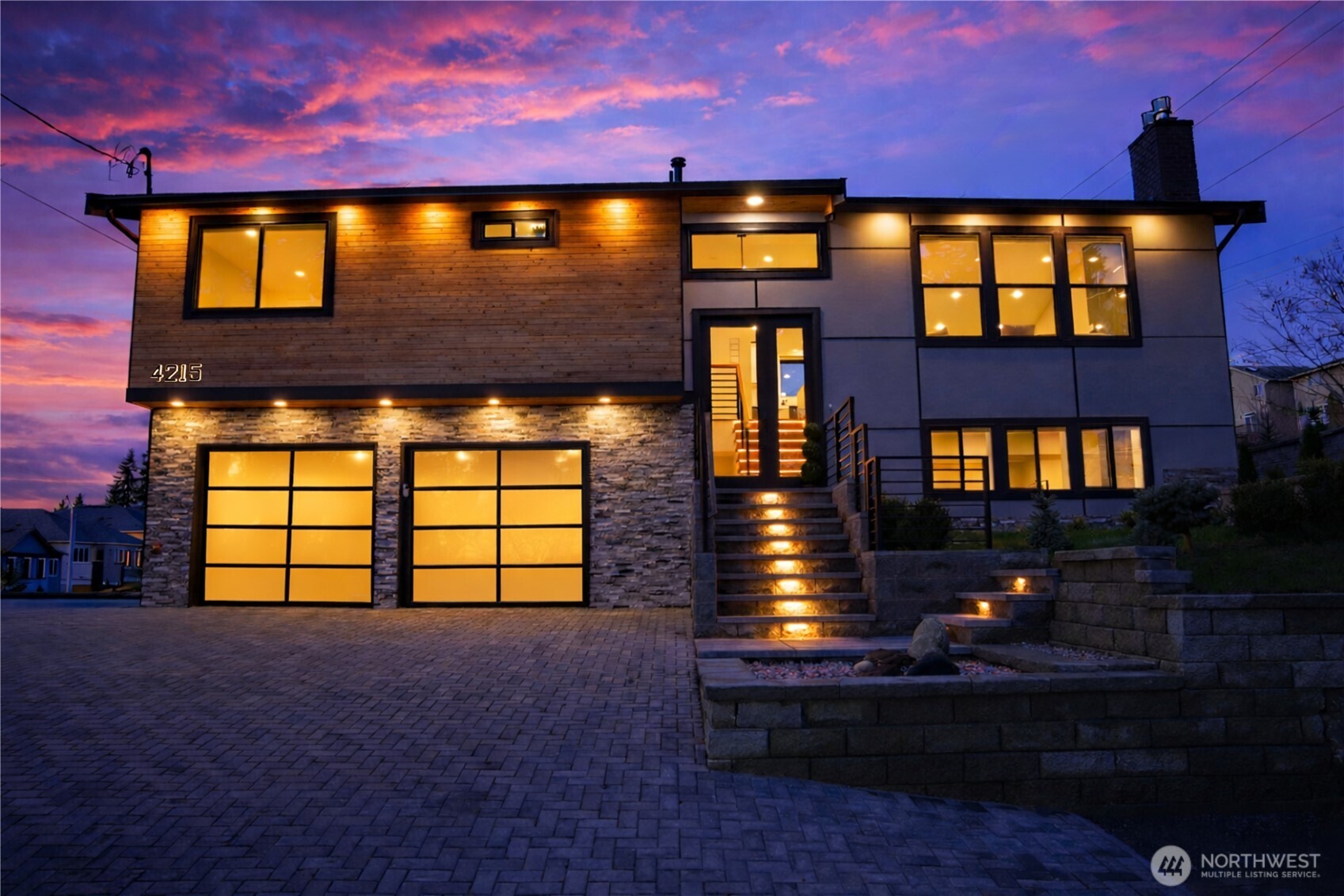 a front view of a building with a yard