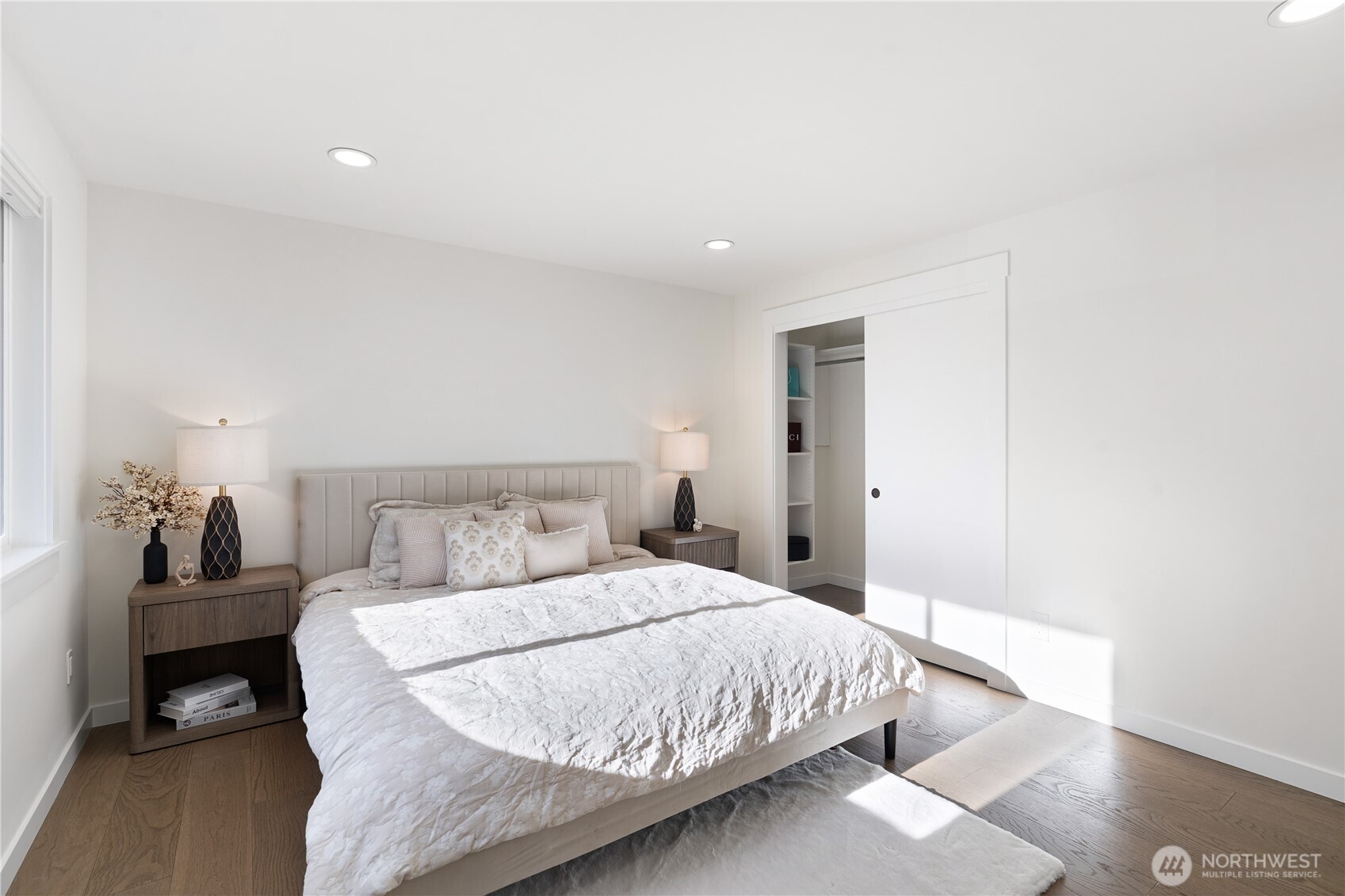 4215 228th Street Southeast Bothell, WA 98021 - Photo 16 of 36 a bedroom with a bed and a lamp