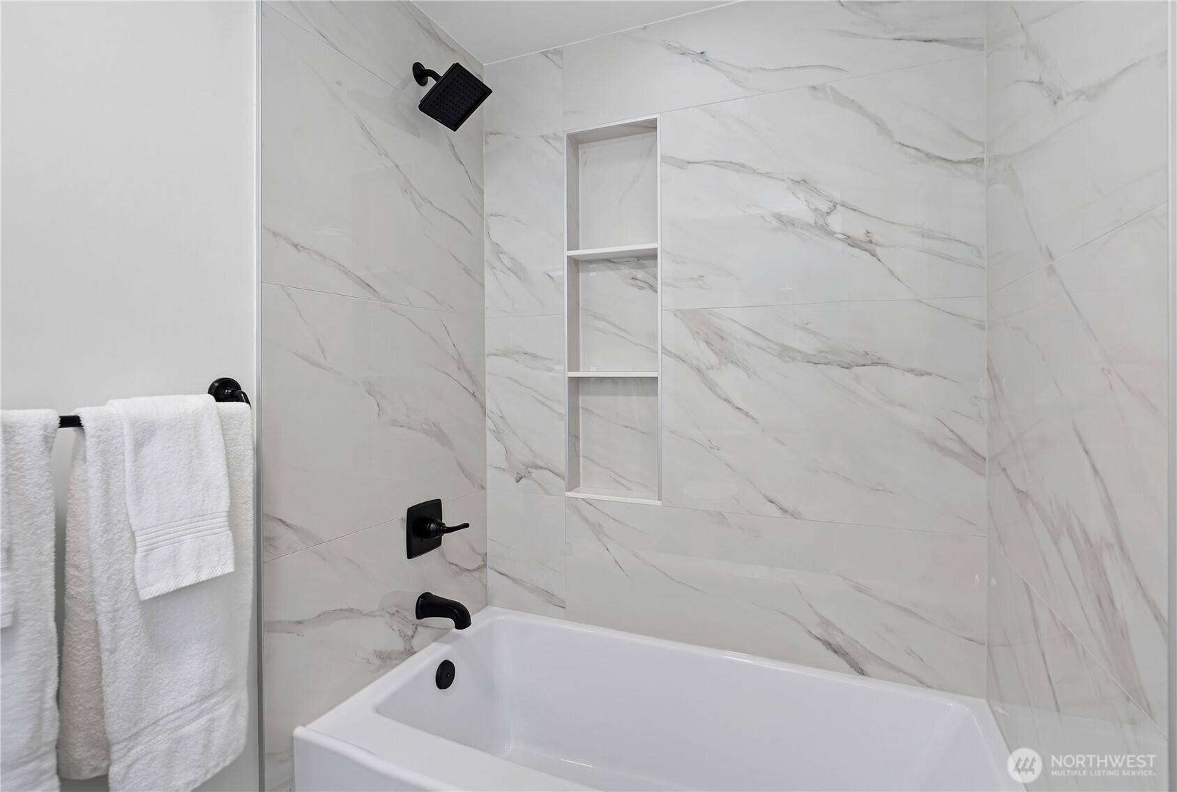 4215 228th Street Southeast Bothell, WA 98021 - Photo 22 of 36 a bathroom with a bathtub