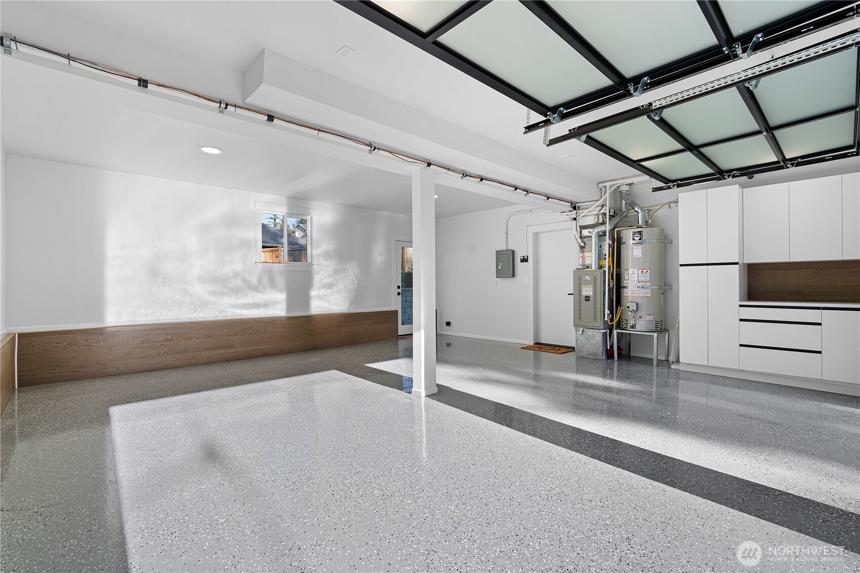 4215 228th Street Southeast Bothell, WA 98021 - Photo 28 of 36 a view of a hallway with wooden floor