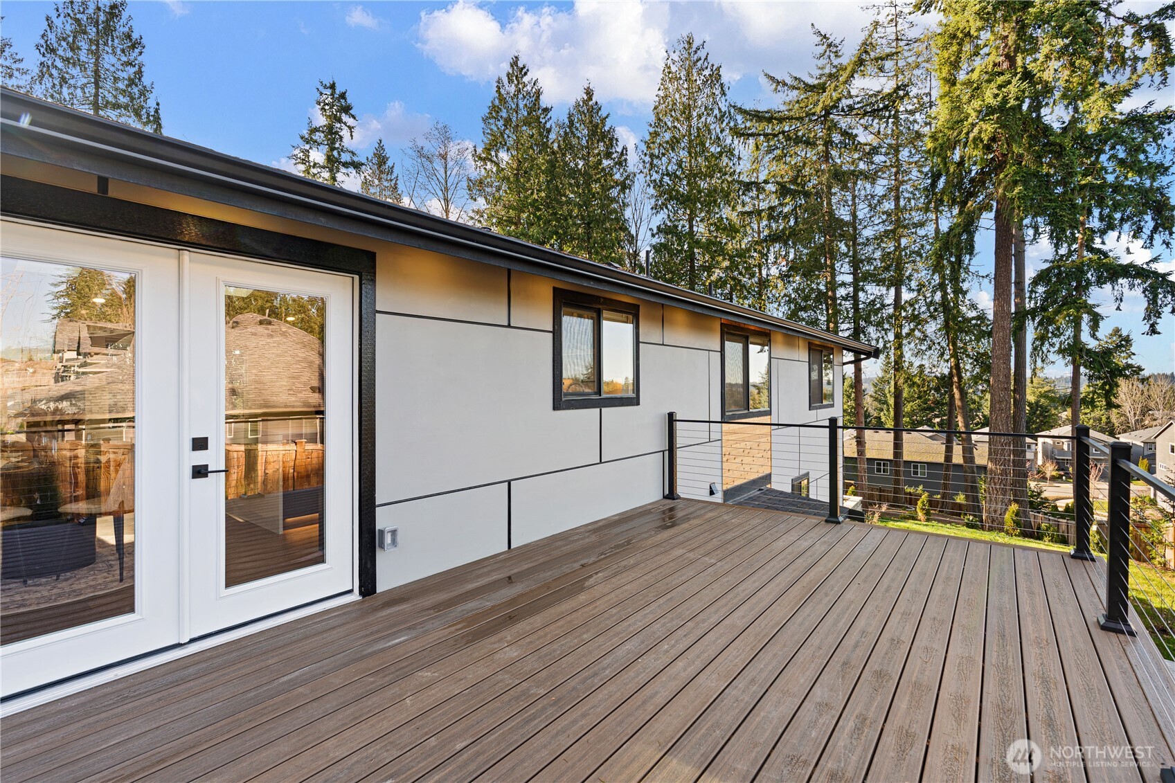 4215 228th Street Southeast Bothell, WA 98021 - Photo 29 of 36 a view of backyard with a deck and wooden floor