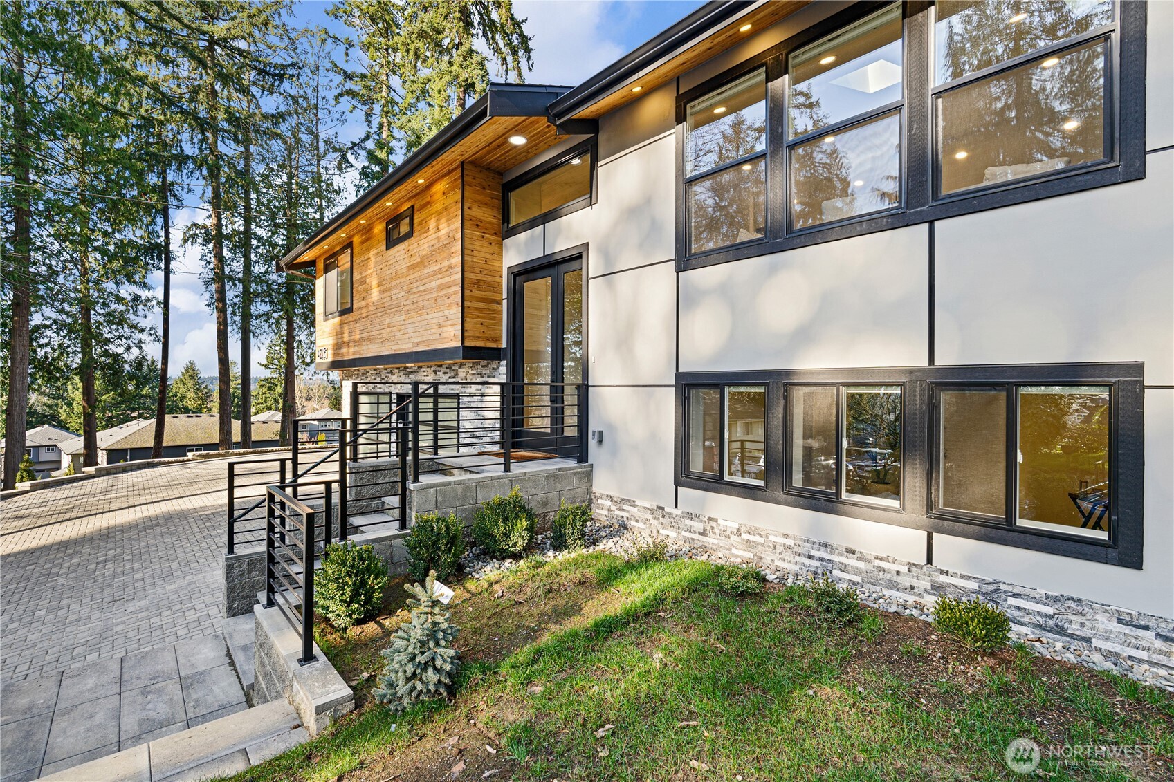 4215 228th Street Southeast Bothell, WA 98021 - Photo 4 of 36 a view of a brick building with a large window