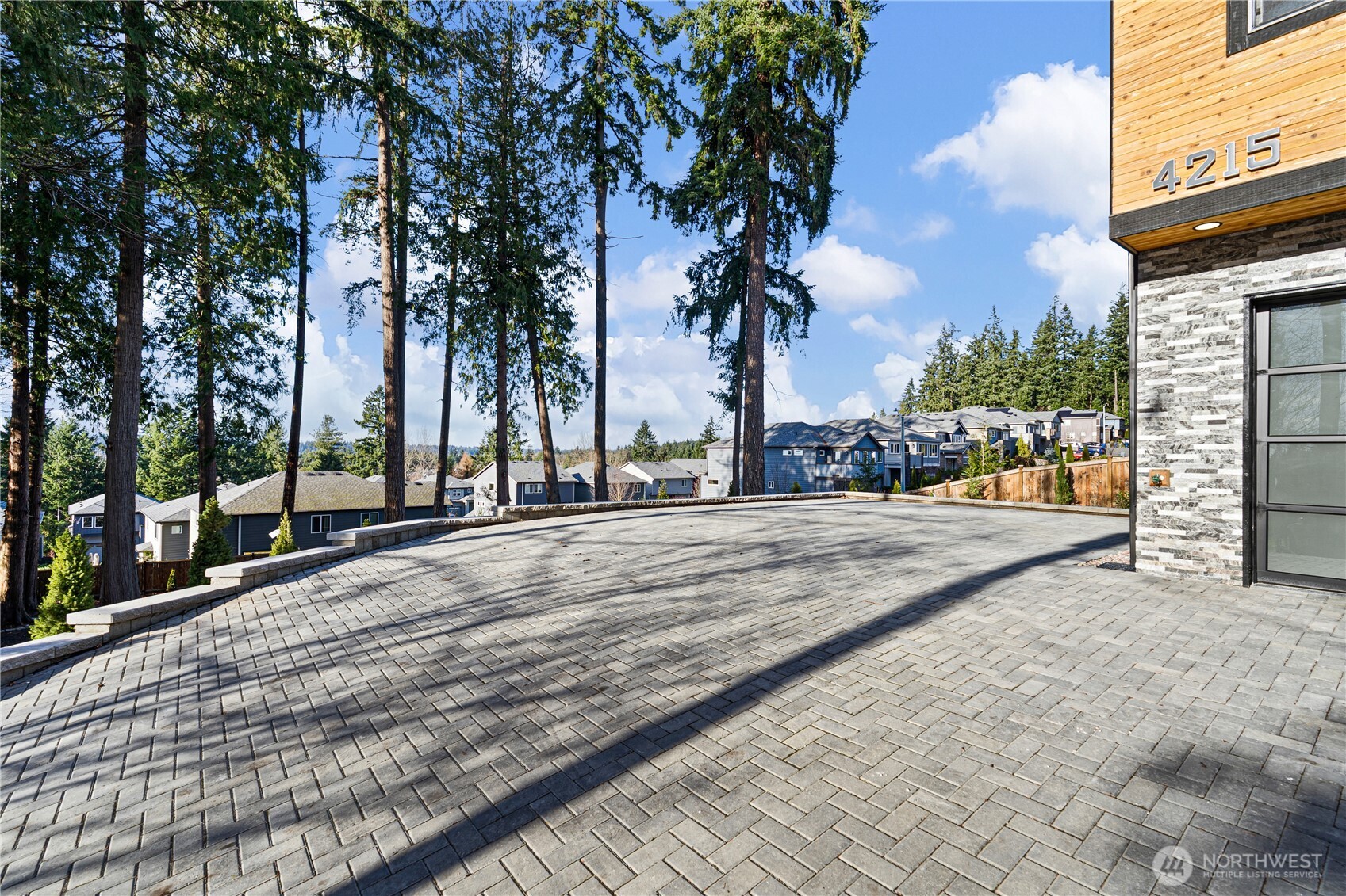 4215 228th Street Southeast Bothell, WA 98021 - Photo 5 of 36 a view of road with a cars parked on the road