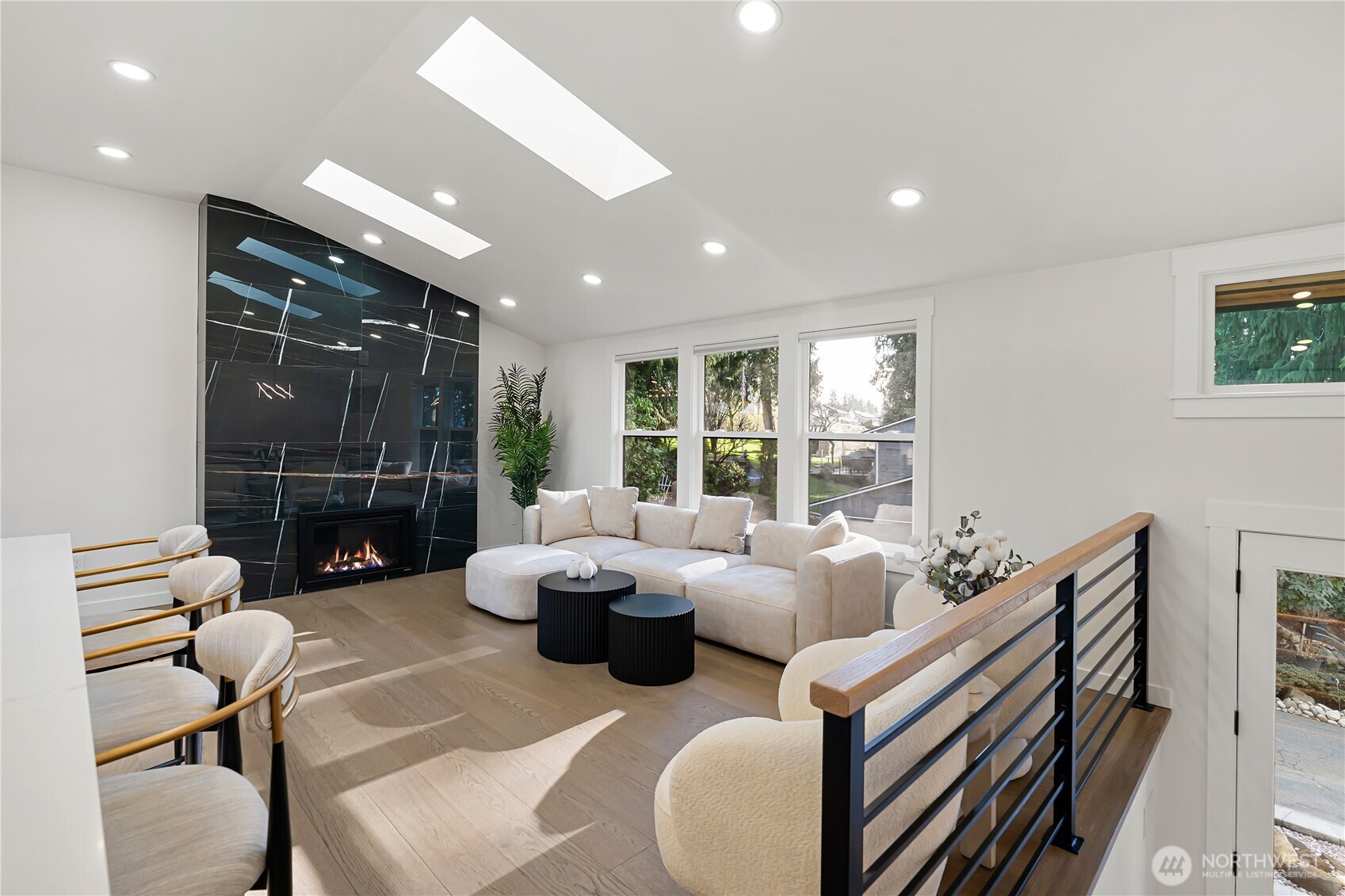 4215 228th Street Southeast Bothell, WA 98021 - Photo 9 of 36 a living room with furniture and a large window