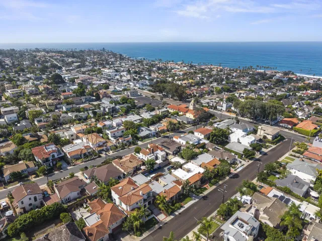 an aerial view of a city with lots of residential buildings