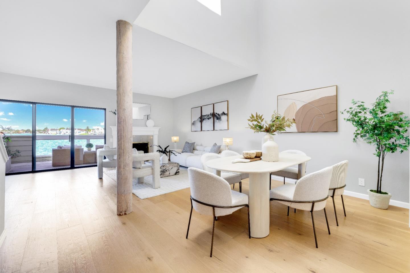 972 Shoreline Drive San Mateo, CA 94404 - Photo 11 of 64 a view of a dining room with furniture and a potted plant