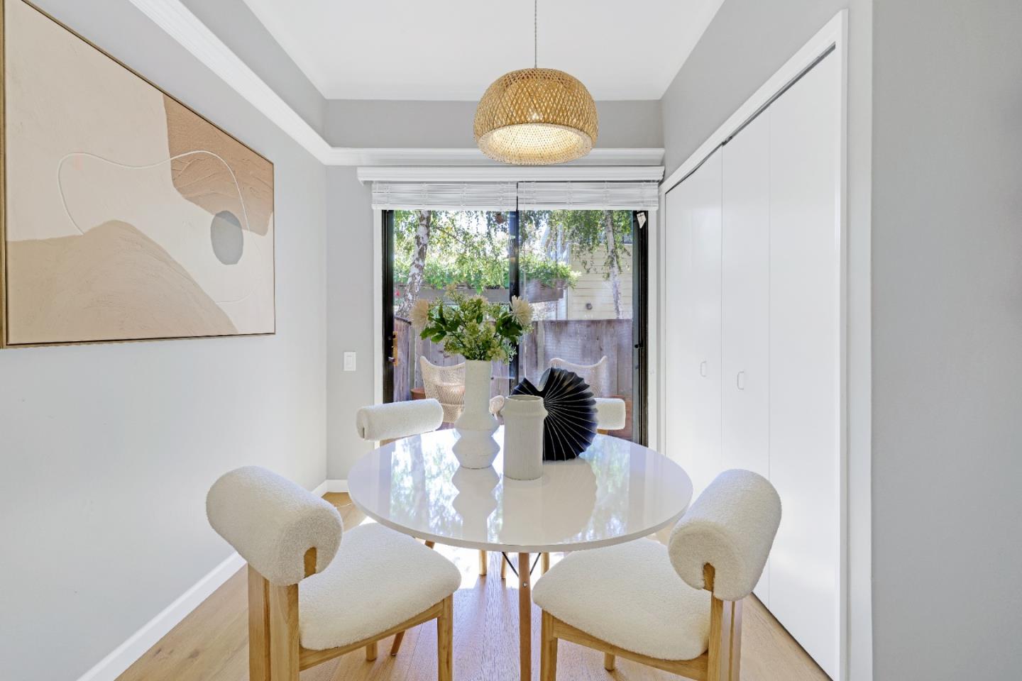 972 Shoreline Drive San Mateo, CA 94404 - Photo 19 of 64 a view of a dining room with furniture window and outside view