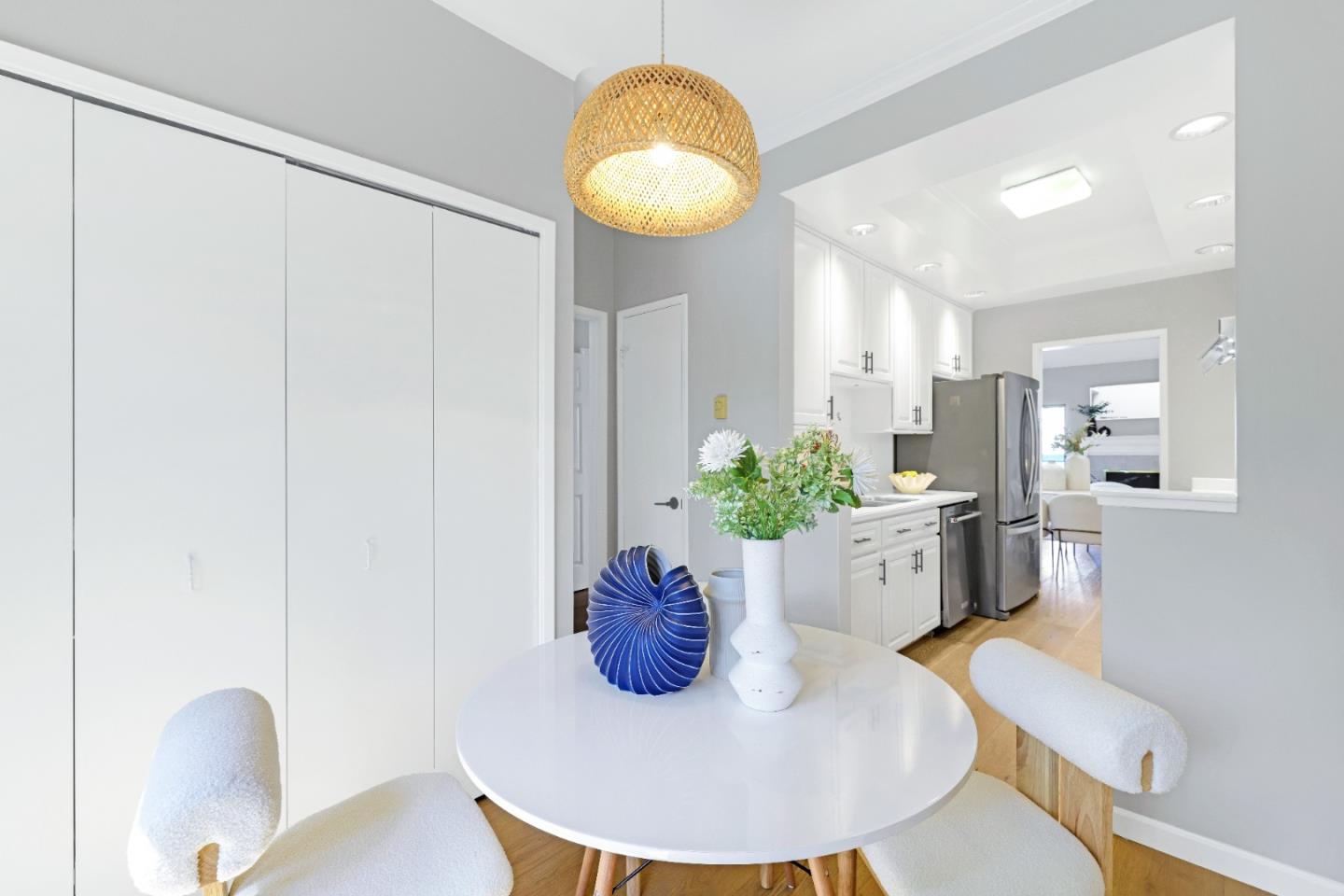 972 Shoreline Drive San Mateo, CA 94404 - Photo 20 of 64 a view of a dining room with furniture and wooden floor