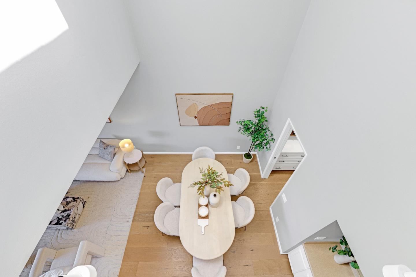 972 Shoreline Drive San Mateo, CA 94404 - Photo 27 of 64 a view of a dining room with furniture and wooden floor