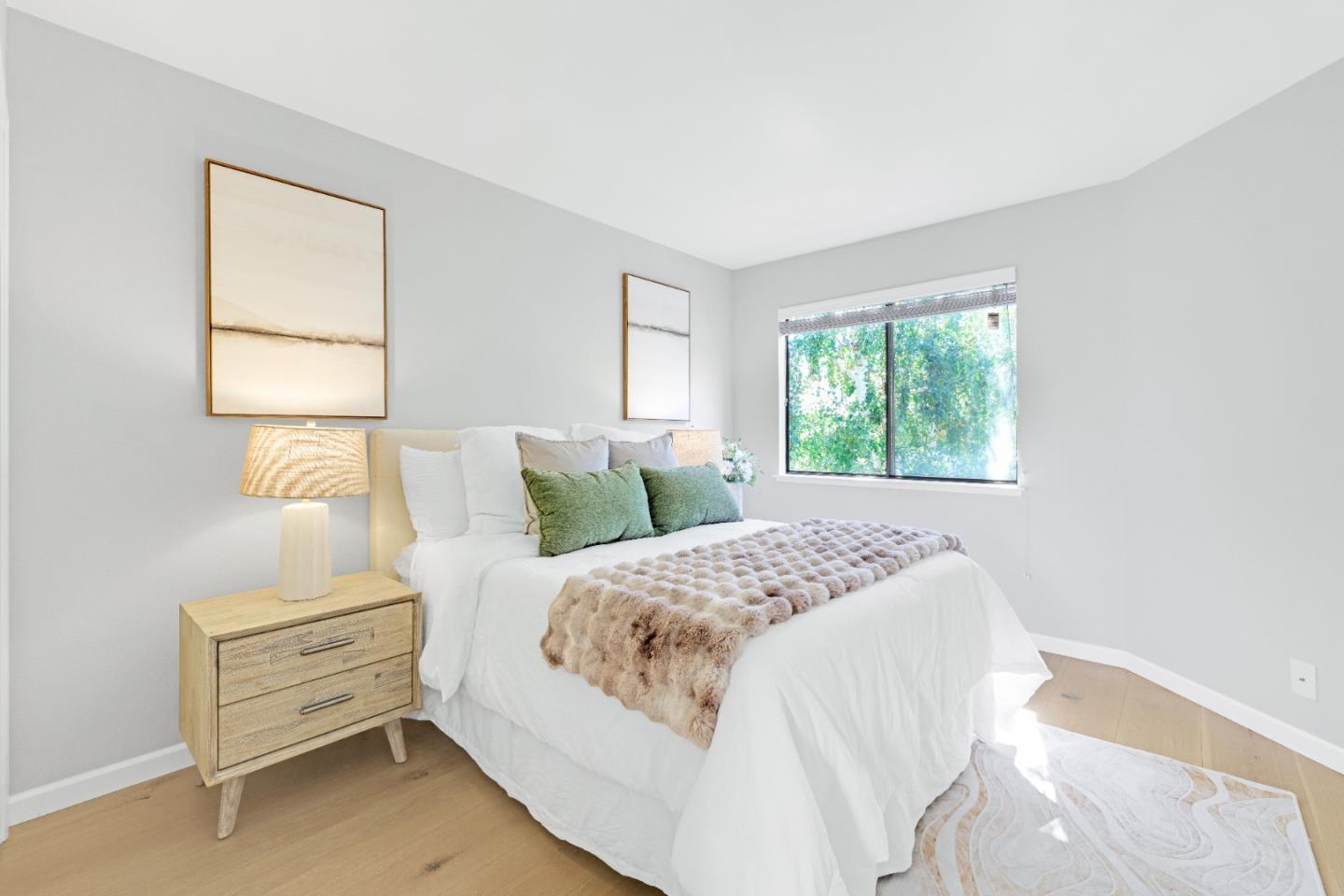 972 Shoreline Drive San Mateo, CA 94404 - Photo 36 of 64 a bedroom with a bed and a window