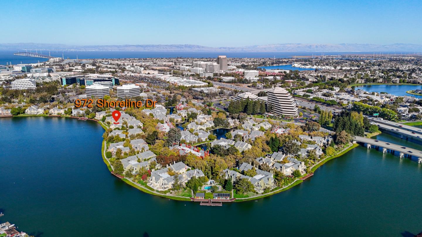 972 Shoreline Drive San Mateo, CA 94404 - Photo 4 of 64 an aerial view of a house with a lake view