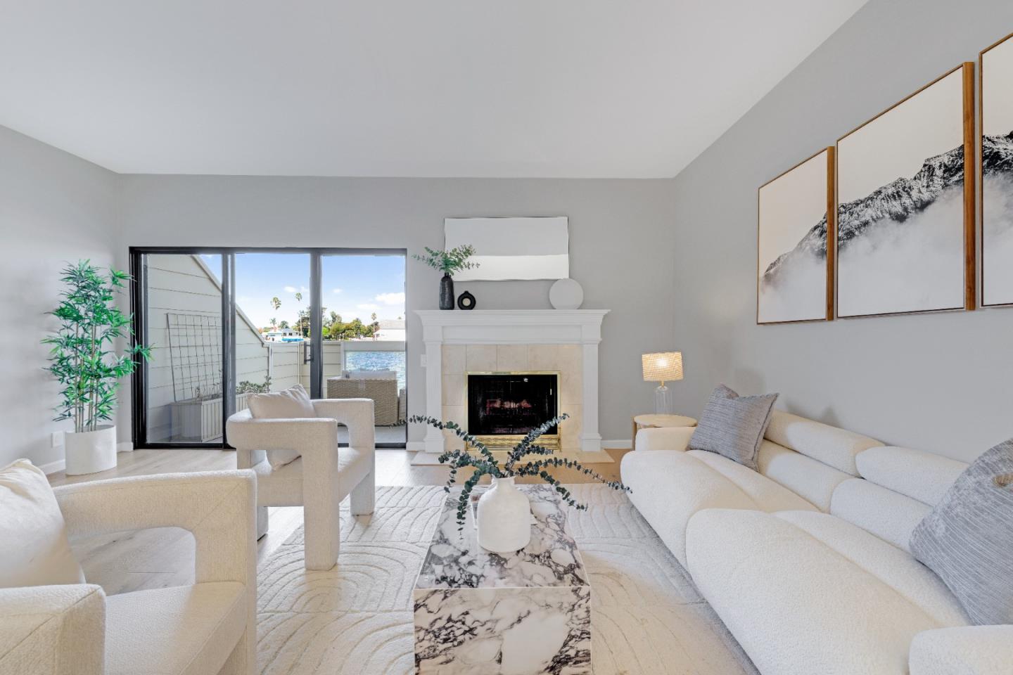 972 Shoreline Drive San Mateo, CA 94404 - Photo 6 of 64 a living room with furniture large window and a fireplace