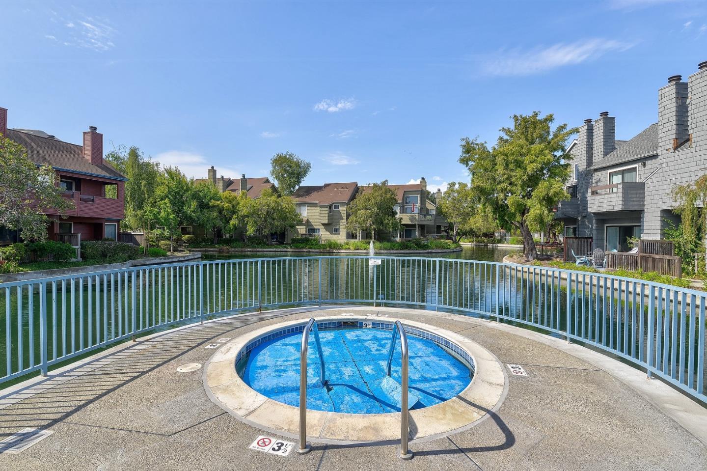 972 Shoreline Drive San Mateo, CA 94404 - Photo 63 of 64 a view of a swimming pool with a lake view