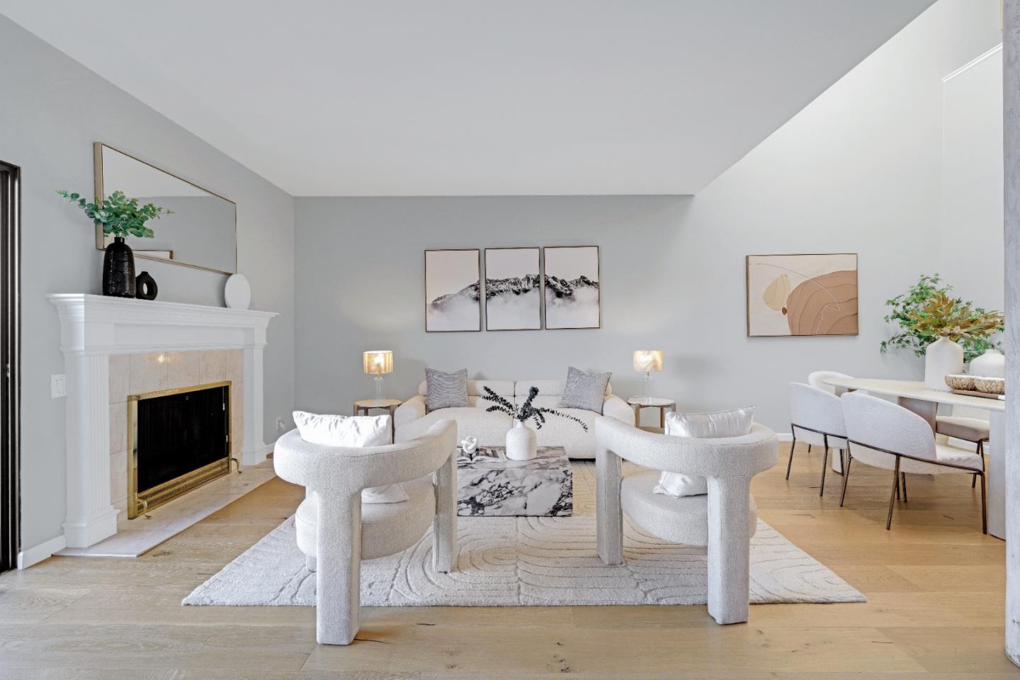 972 Shoreline Drive San Mateo, CA 94404 - Photo 10 of 64 a living room with furniture a fireplace and a potted plant