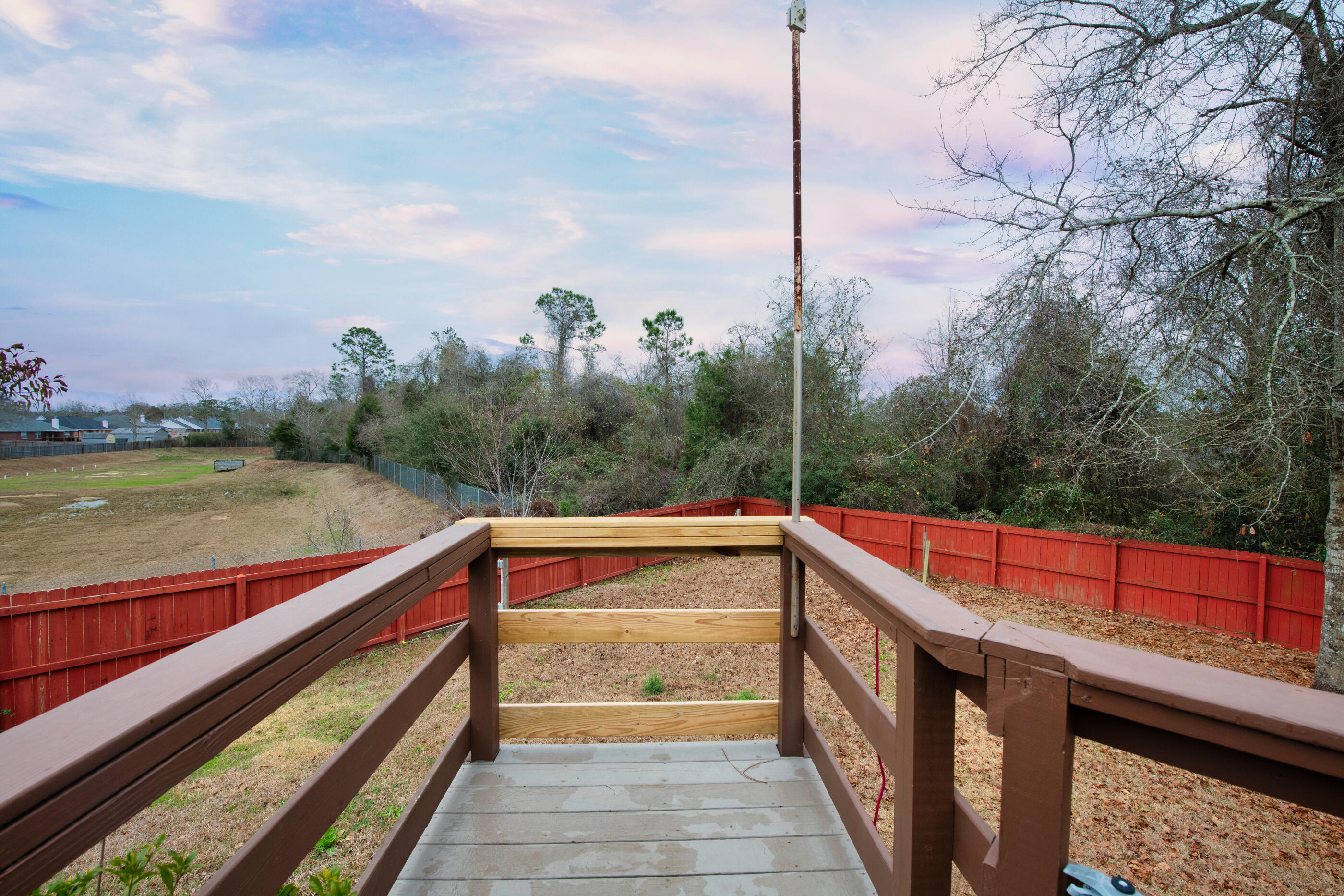 1680 Twin Pines Circle Cantonment, FL 32533 - Photo 11 of 39 a view of balcony with two chairs