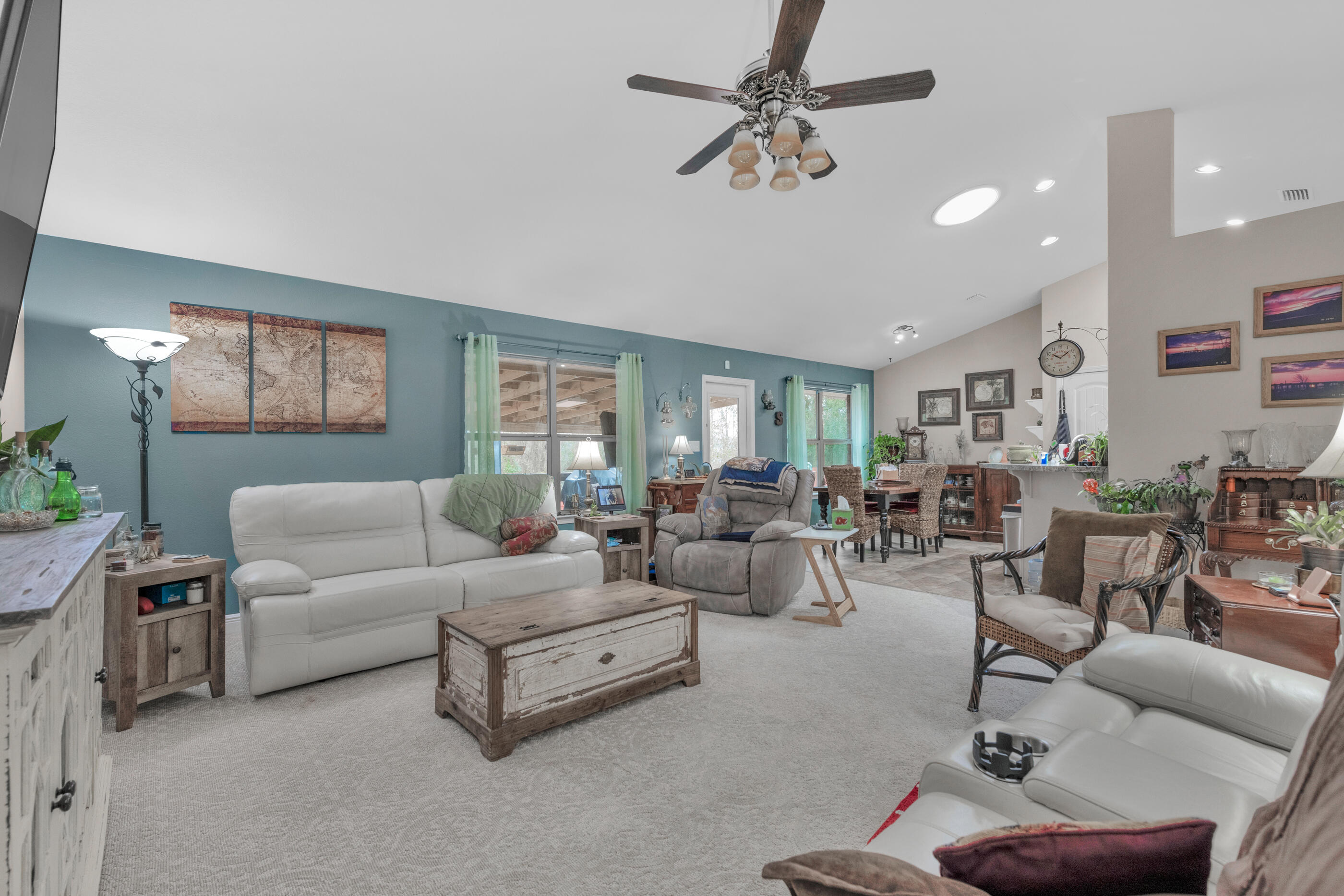 1680 Twin Pines Circle Cantonment, FL 32533 - Photo 17 of 39 a living room with furniture and a large window