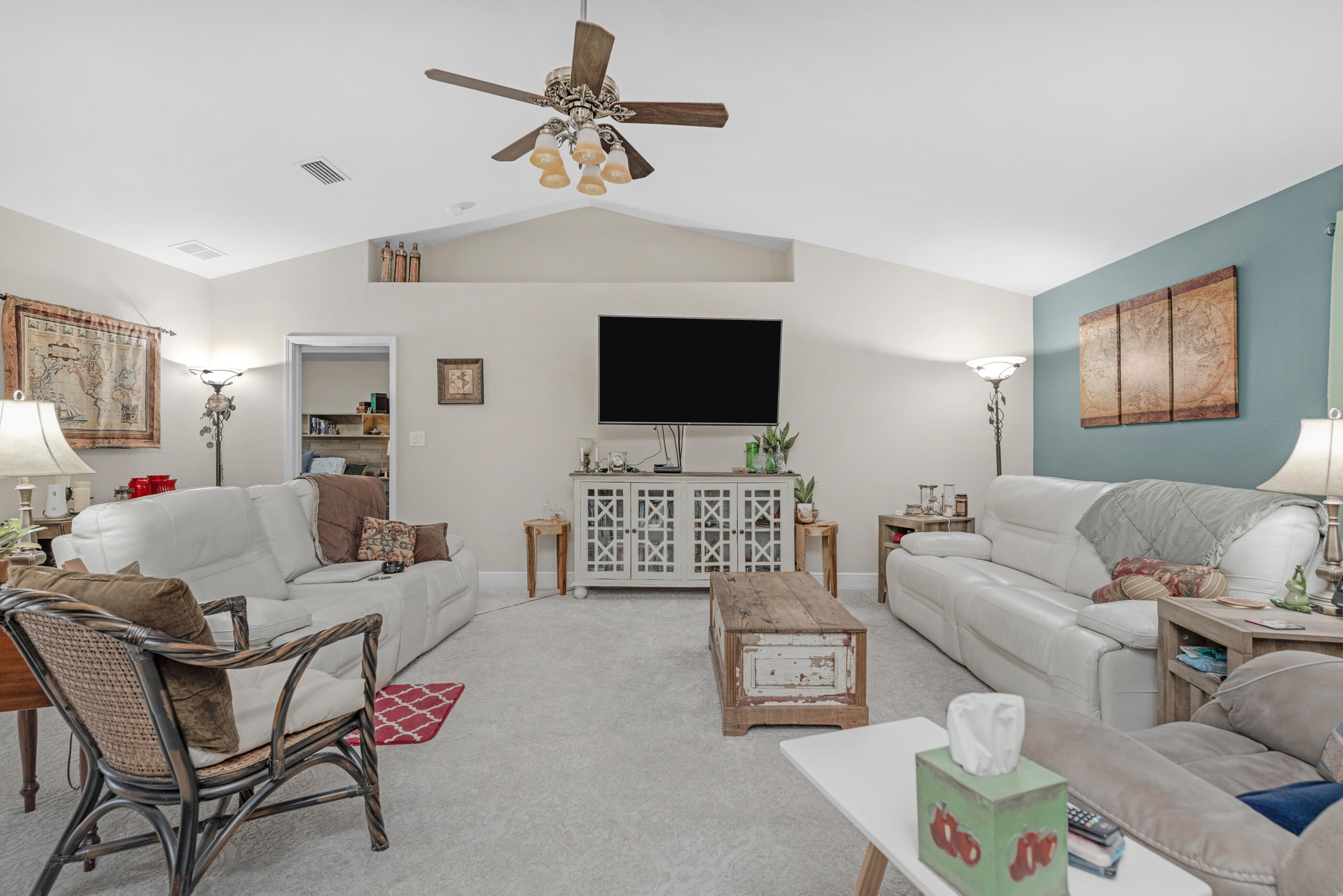 1680 Twin Pines Circle Cantonment, FL 32533 - Photo 19 of 39 a living room with furniture and a flat screen tv