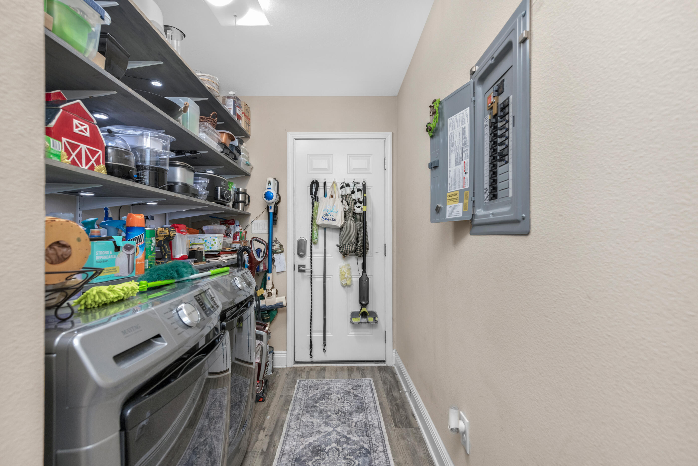 1680 Twin Pines Circle Cantonment, FL 32533 - Photo 27 of 39 a room with storage and utility