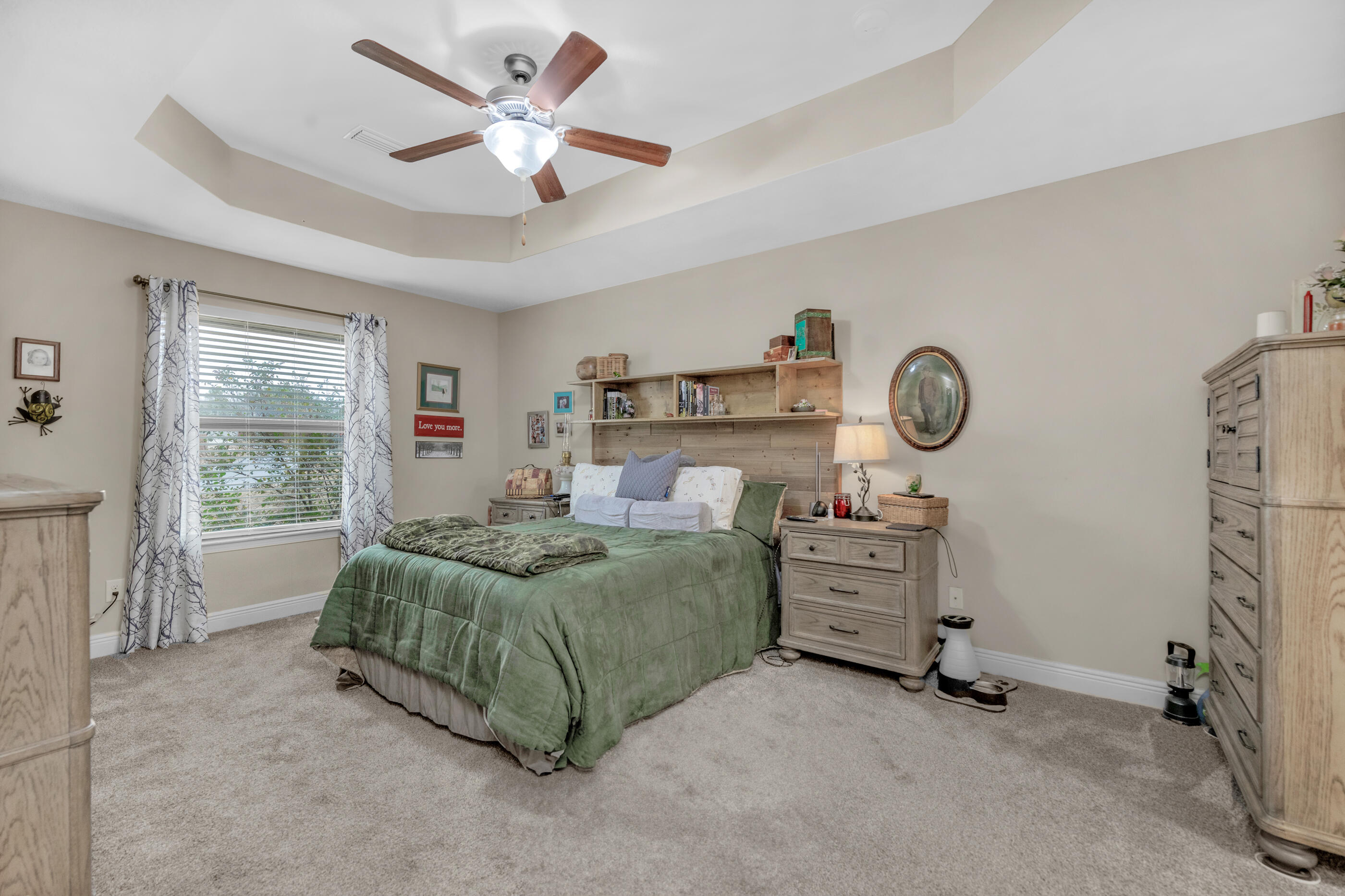 1680 Twin Pines Circle Cantonment, FL 32533 - Photo 28 of 39 a living room with furniture and a window