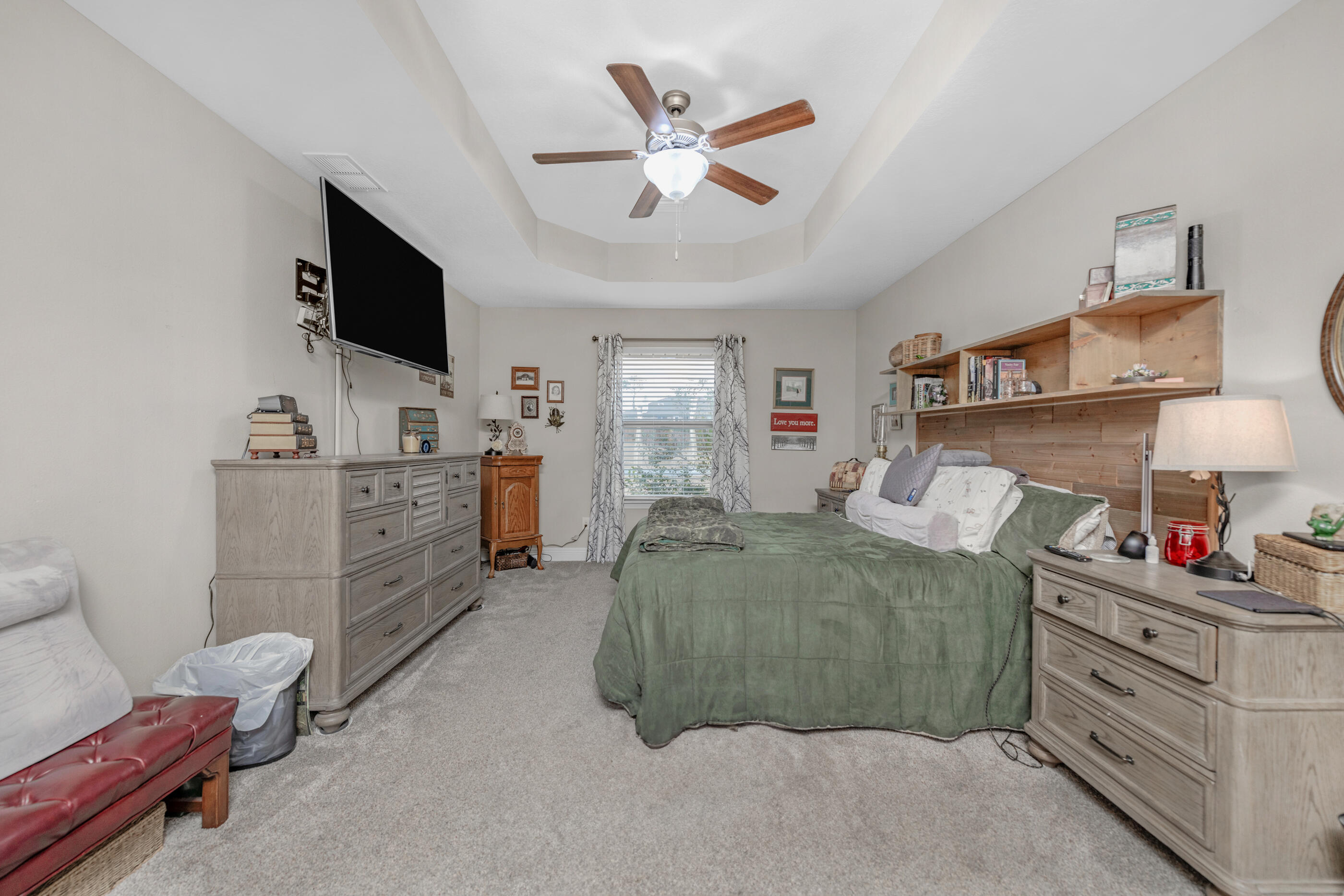 1680 Twin Pines Circle Cantonment, FL 32533 - Photo 29 of 39 a bedroom with a bed and furniture