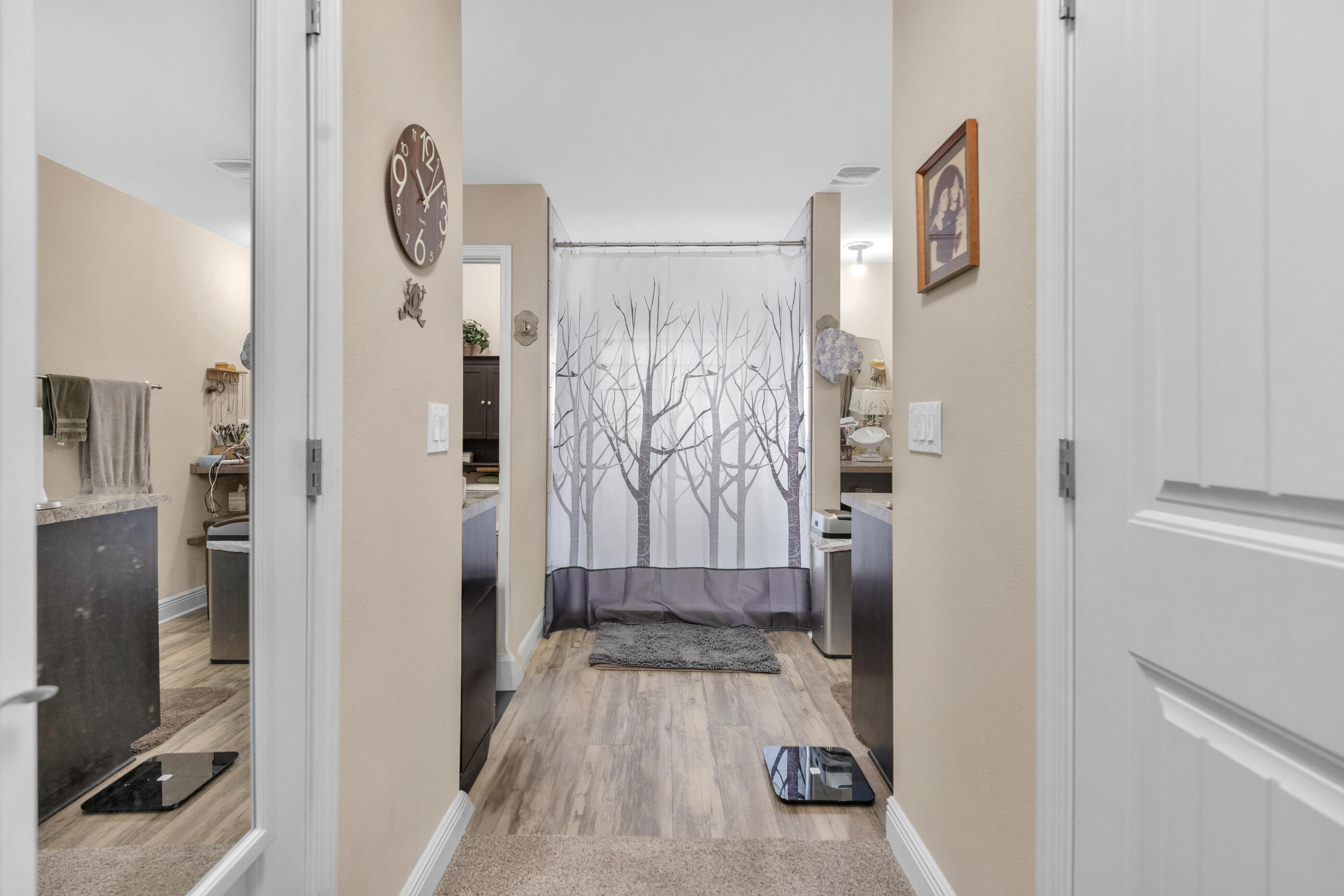 1680 Twin Pines Circle Cantonment, FL 32533 - Photo 31 of 39 a bathroom with a tub and shower