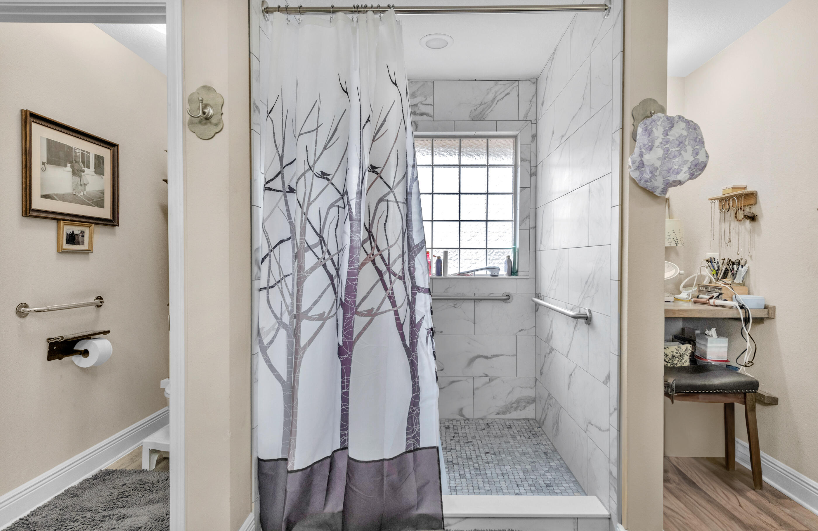 1680 Twin Pines Circle Cantonment, FL 32533 - Photo 35 of 39 a bathroom with a bathtub and a shower