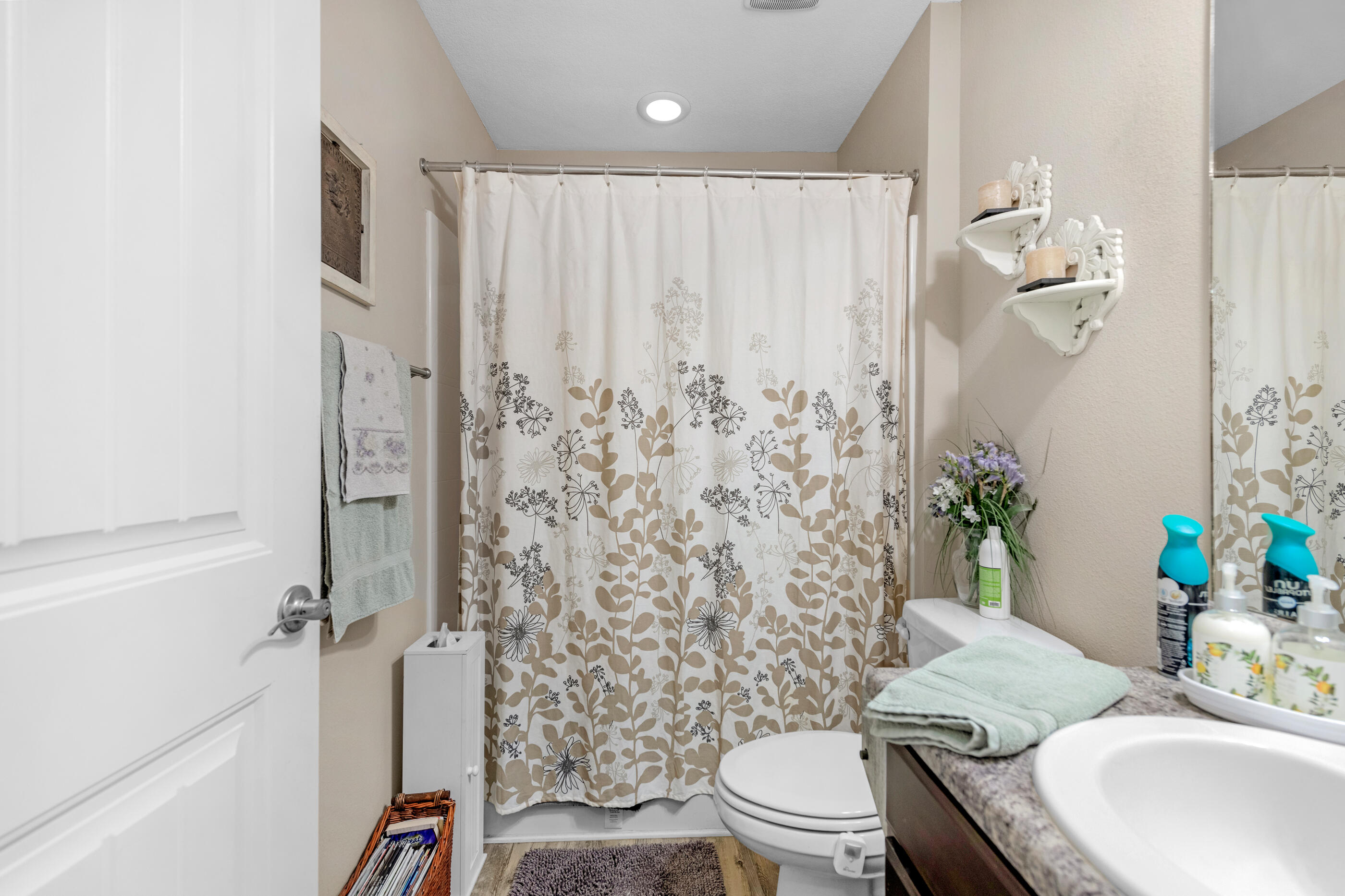 1680 Twin Pines Circle Cantonment, FL 32533 - Photo 37 of 39 a bathroom with a sink toilet and shower