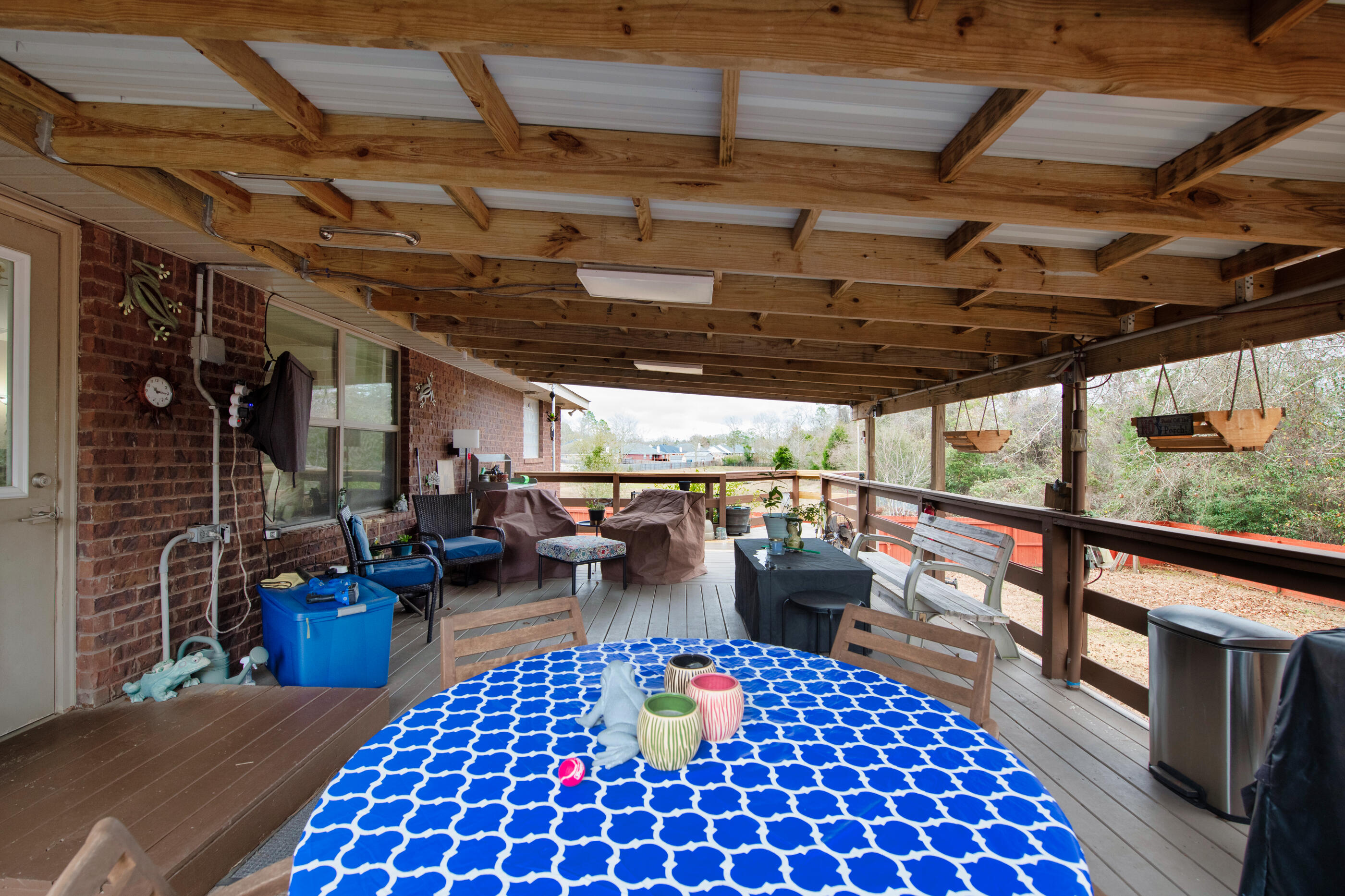 1680 Twin Pines Circle Cantonment, FL 32533 - Photo 10 of 39 a view of a porch with furniture