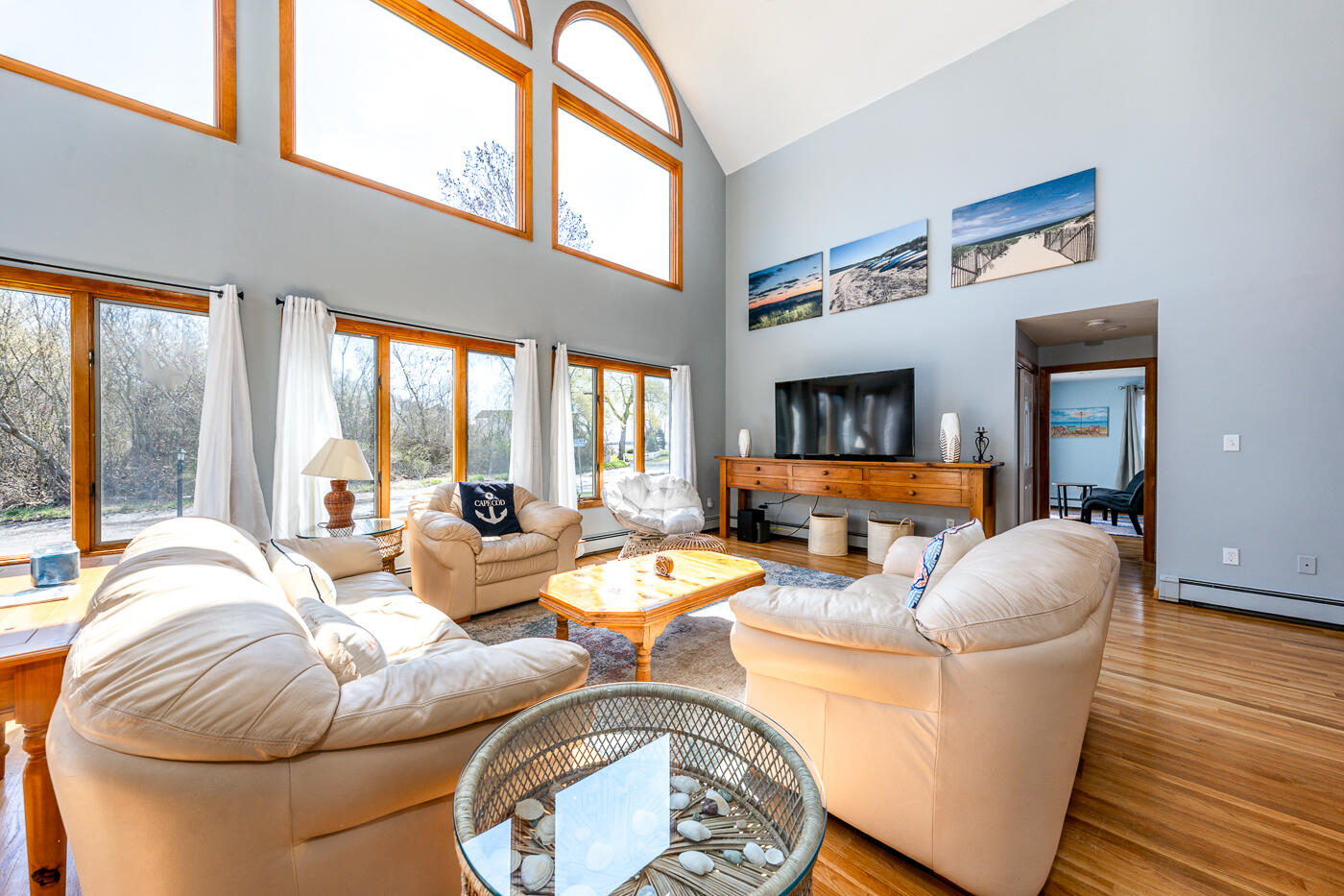 33 Island View Road Hyannis, MA 02601 - Photo 12 of 64 a living room with fireplace furniture and a large window