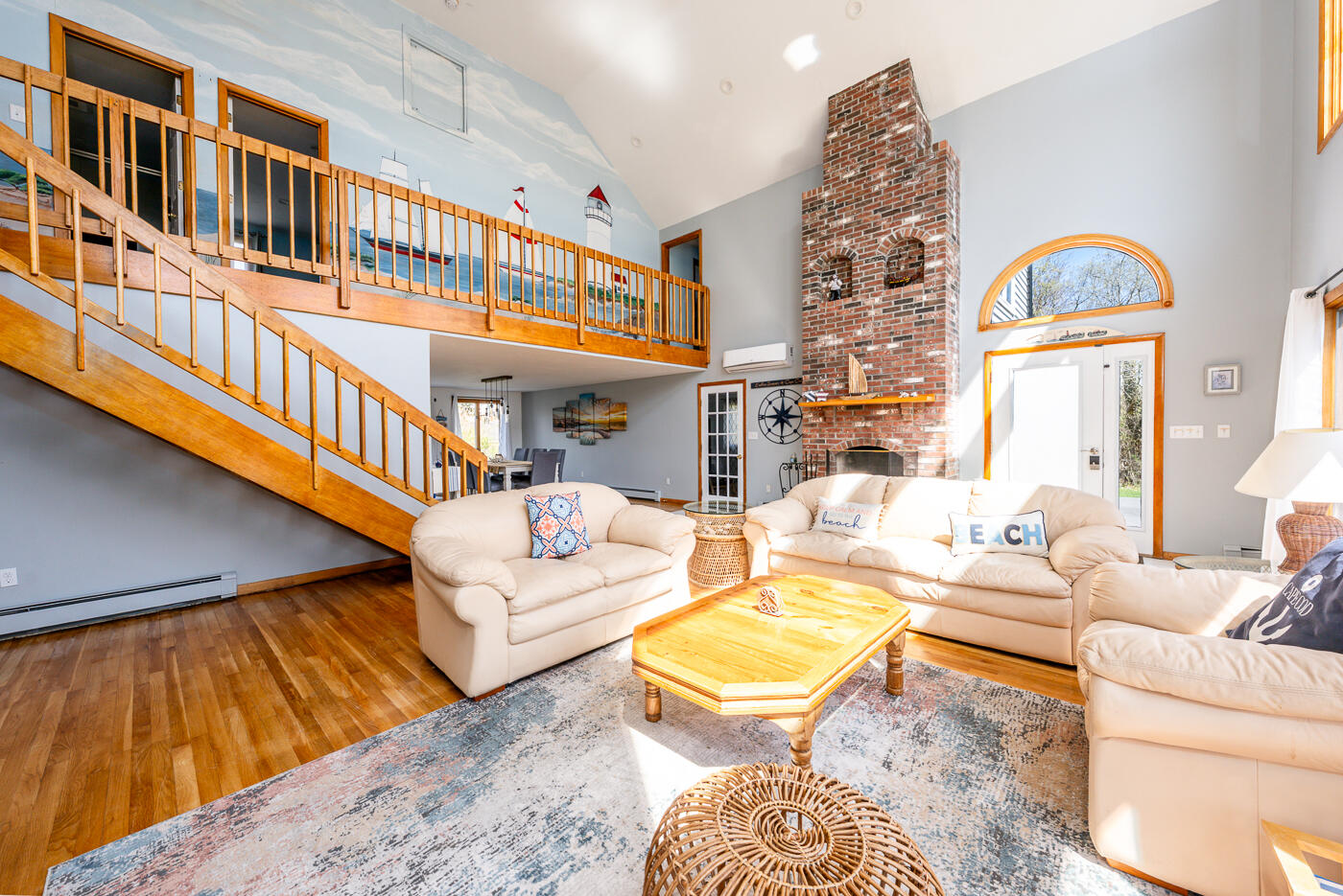 33 Island View Road Hyannis, MA 02601 - Photo 14 of 64 a living room with fireplace furniture and a rug