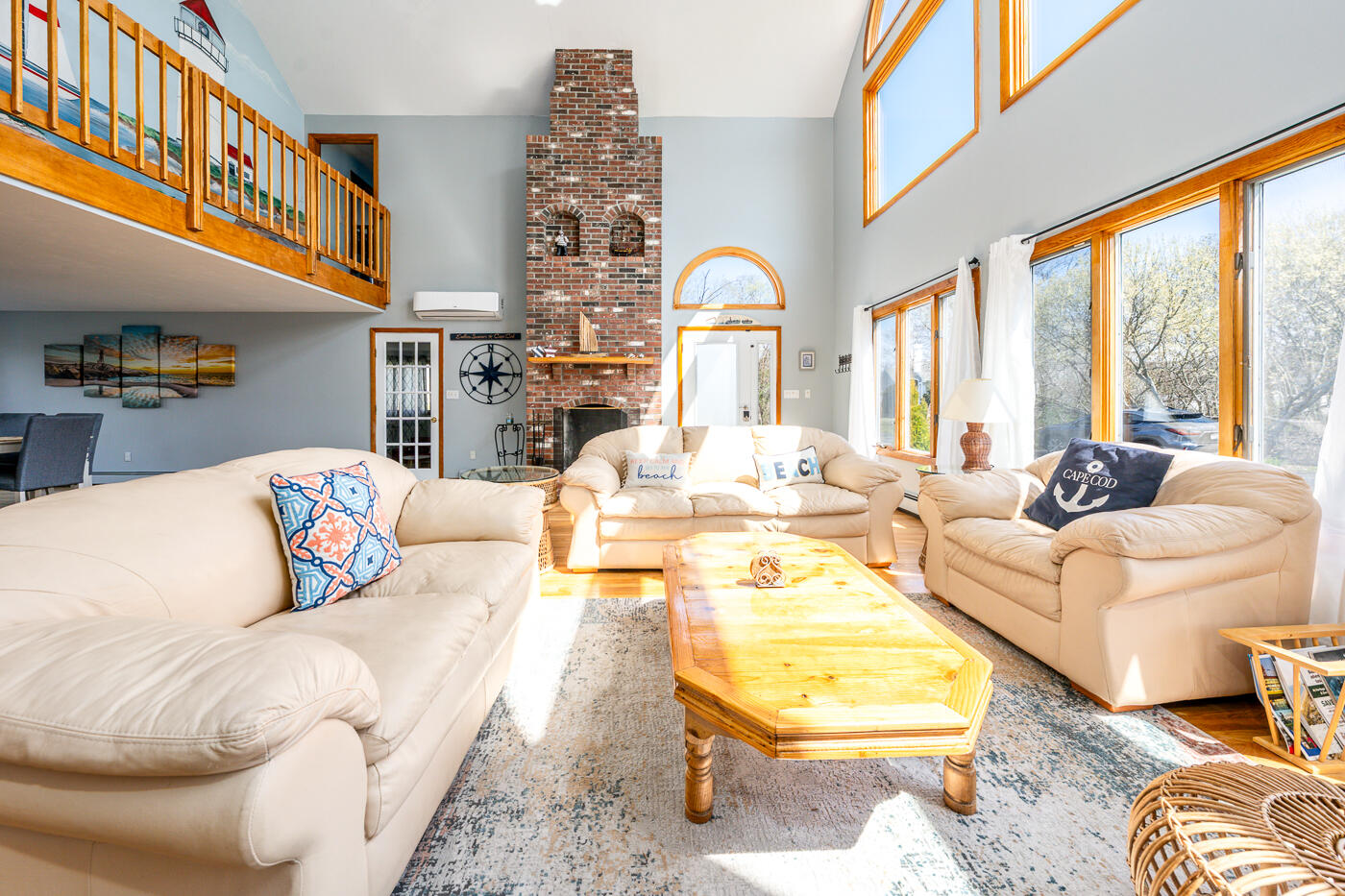 33 Island View Road Hyannis, MA 02601 - Photo 15 of 64 a living room with fireplace furniture and a large window