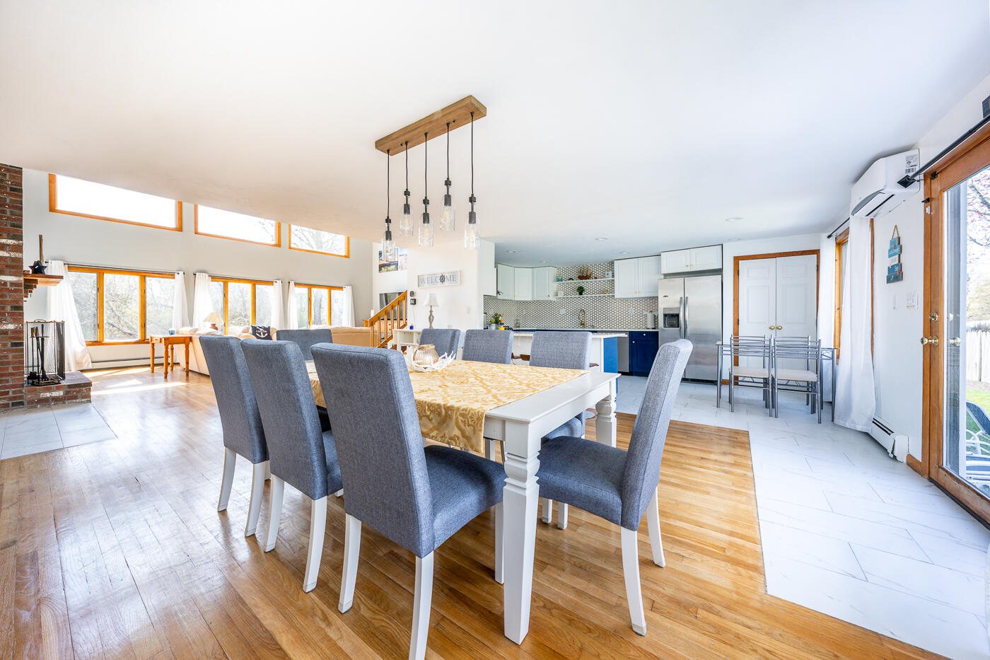 33 Island View Road Hyannis, MA 02601 - Photo 19 of 64 a view of a dining room with furniture window and wooden floor