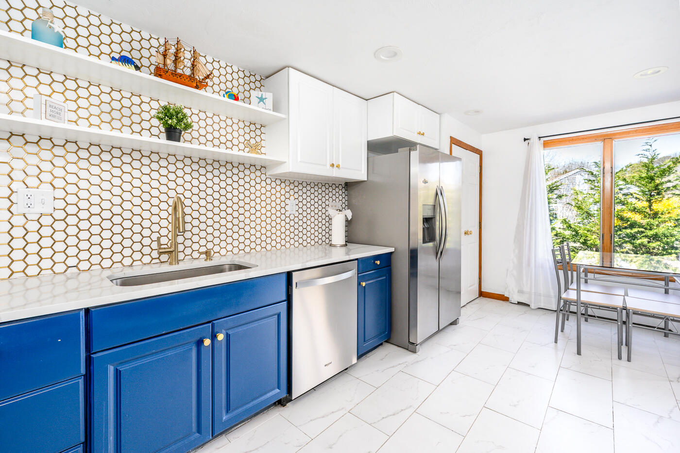 33 Island View Road Hyannis, MA 02601 - Photo 23 of 64 a kitchen with a wooden cabinets and refrigerator