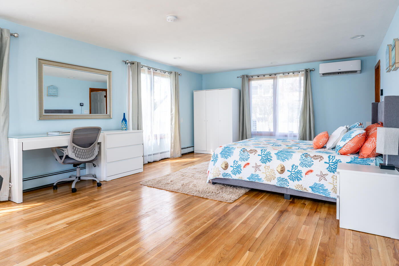 33 Island View Road Hyannis, MA 02601 - Photo 28 of 64 a bedroom with a bed and wooden floor