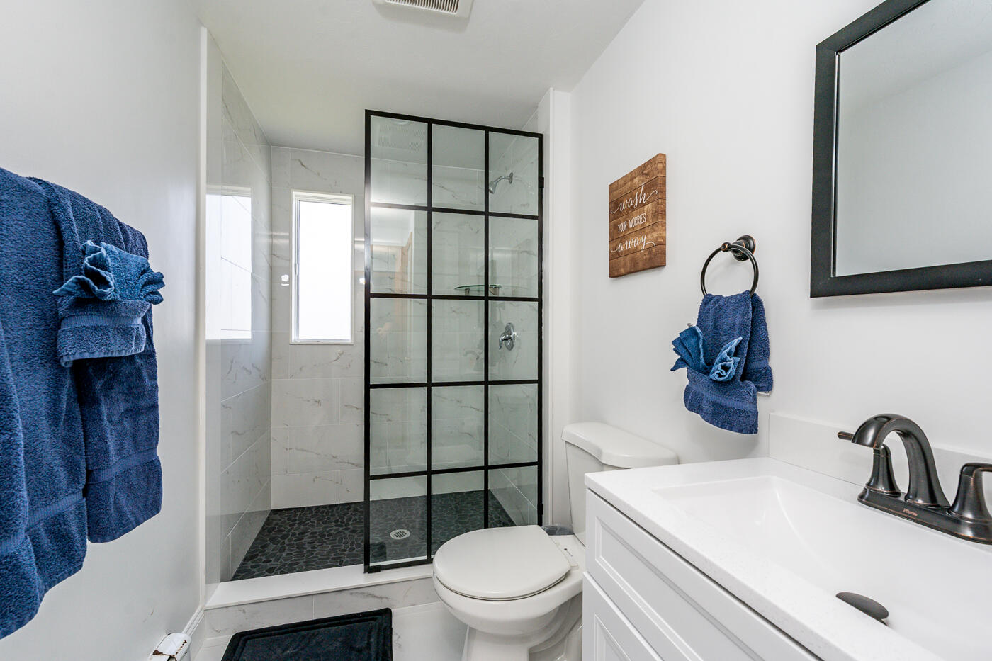 33 Island View Road Hyannis, MA 02601 - Photo 35 of 64 a bathroom with a sink toilet and shower