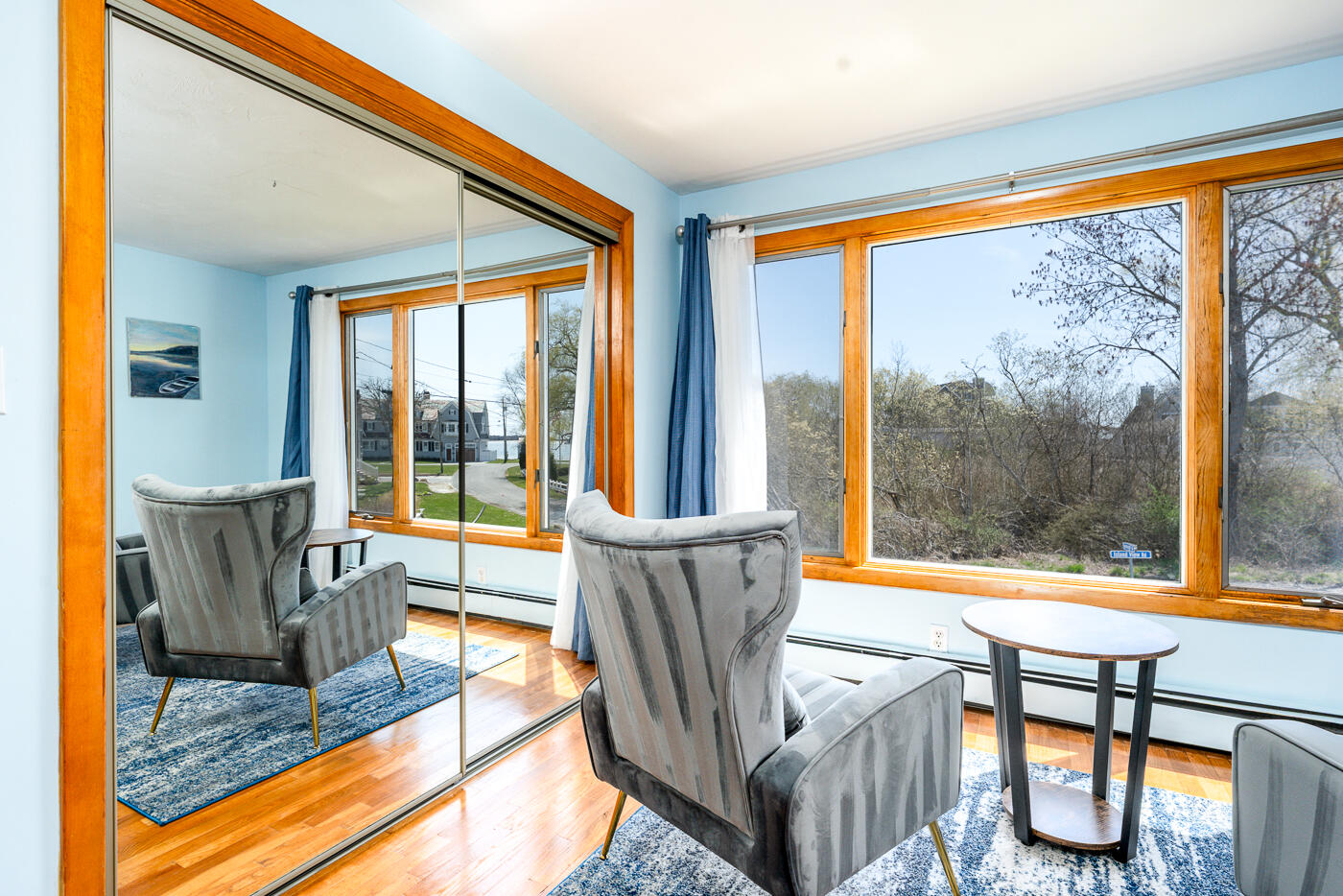 33 Island View Road Hyannis, MA 02601 - Photo 36 of 64 a living room with furniture and a floor to ceiling window