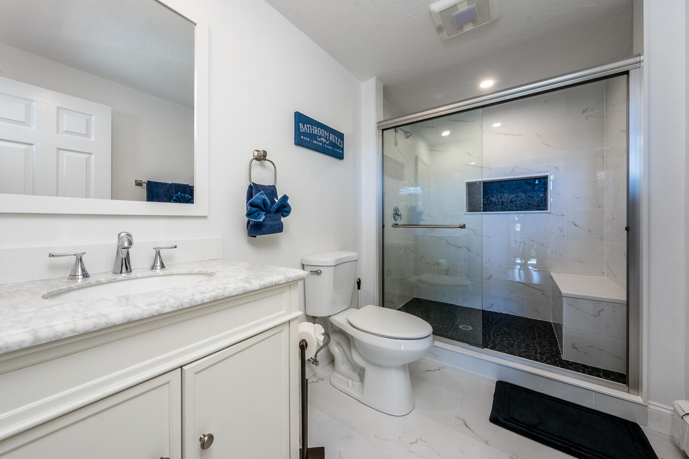 33 Island View Road Hyannis, MA 02601 - Photo 39 of 64 a bathroom with a granite countertop sink a toilet and a mirror