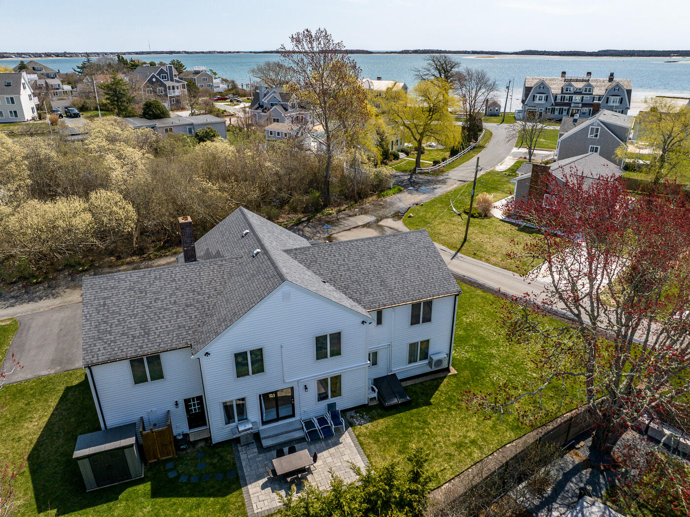 33 Island View Road Hyannis, MA 02601 - Photo 51 of 64 an aerial view of a house with a swimming pool and outdoor seating