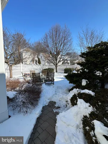 a row of parking space with lots of trees