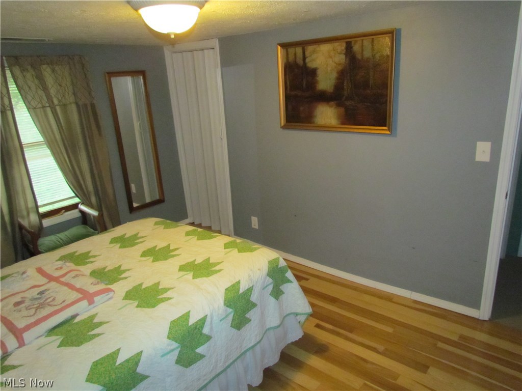 65 Bently Road Walker, WV 26180 - Photo 15 of 21 Bedroom 2 - newer hardwood flooring