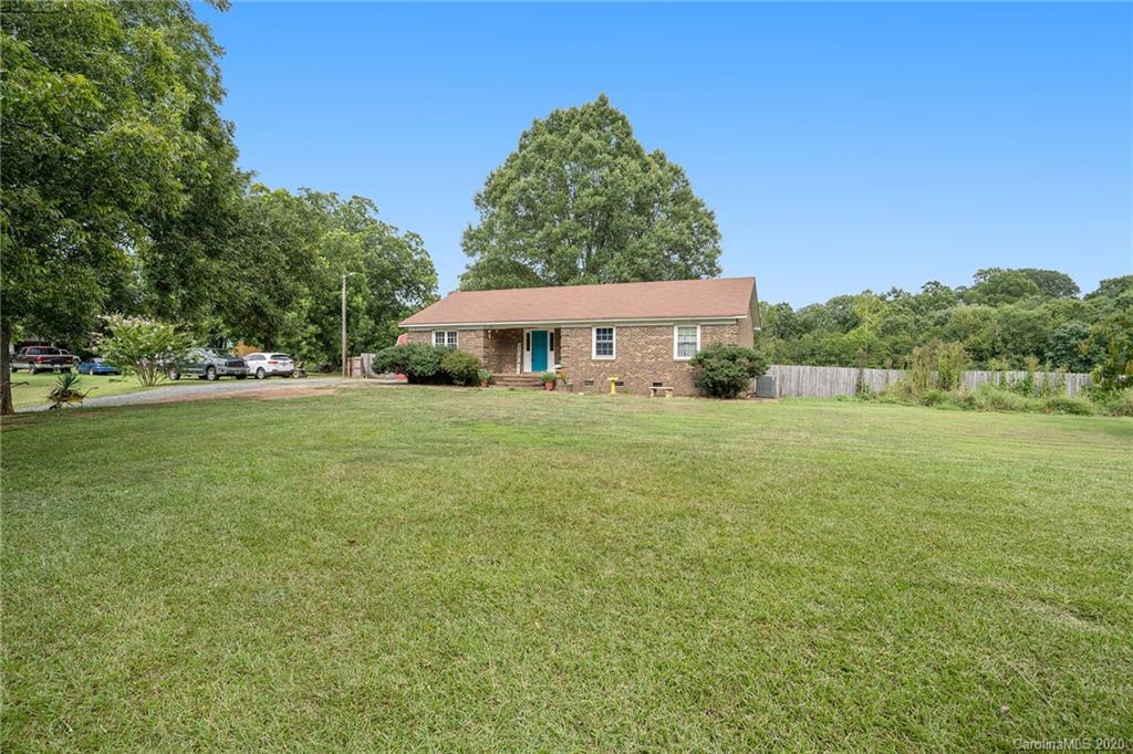 1714 East Sandy Ridge Road Monroe, NC 28112 - Photo 2 of 28 a view of an outdoor space with yard and green space