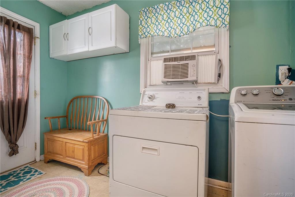 1714 East Sandy Ridge Road Monroe, NC 28112 - Photo 14 of 28 a utility room with dryer and washer