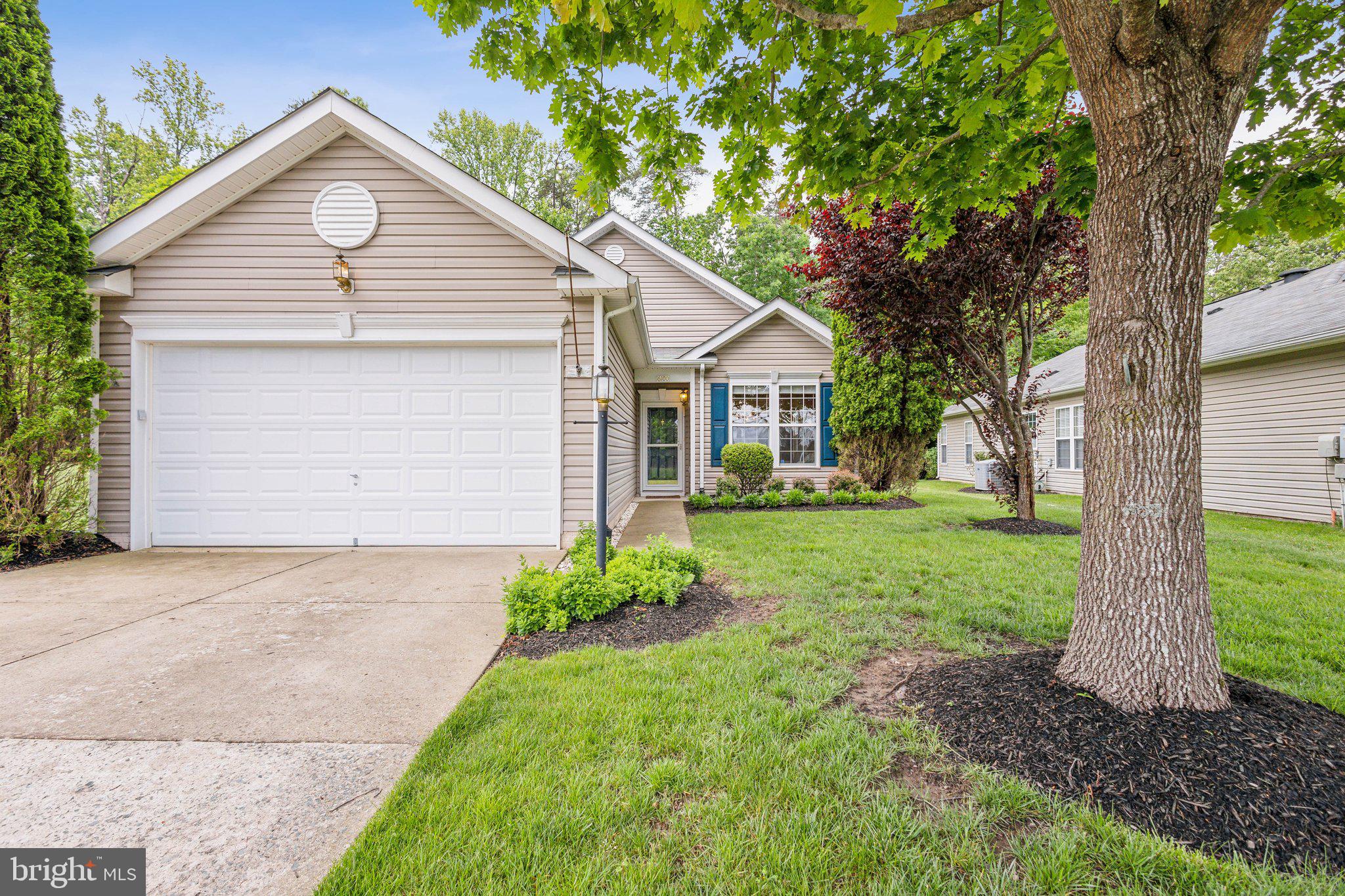 16100 Dancing Leaf Place Dumfries, VA 22025 - Photo 1 of 35 a view of a house with a yard