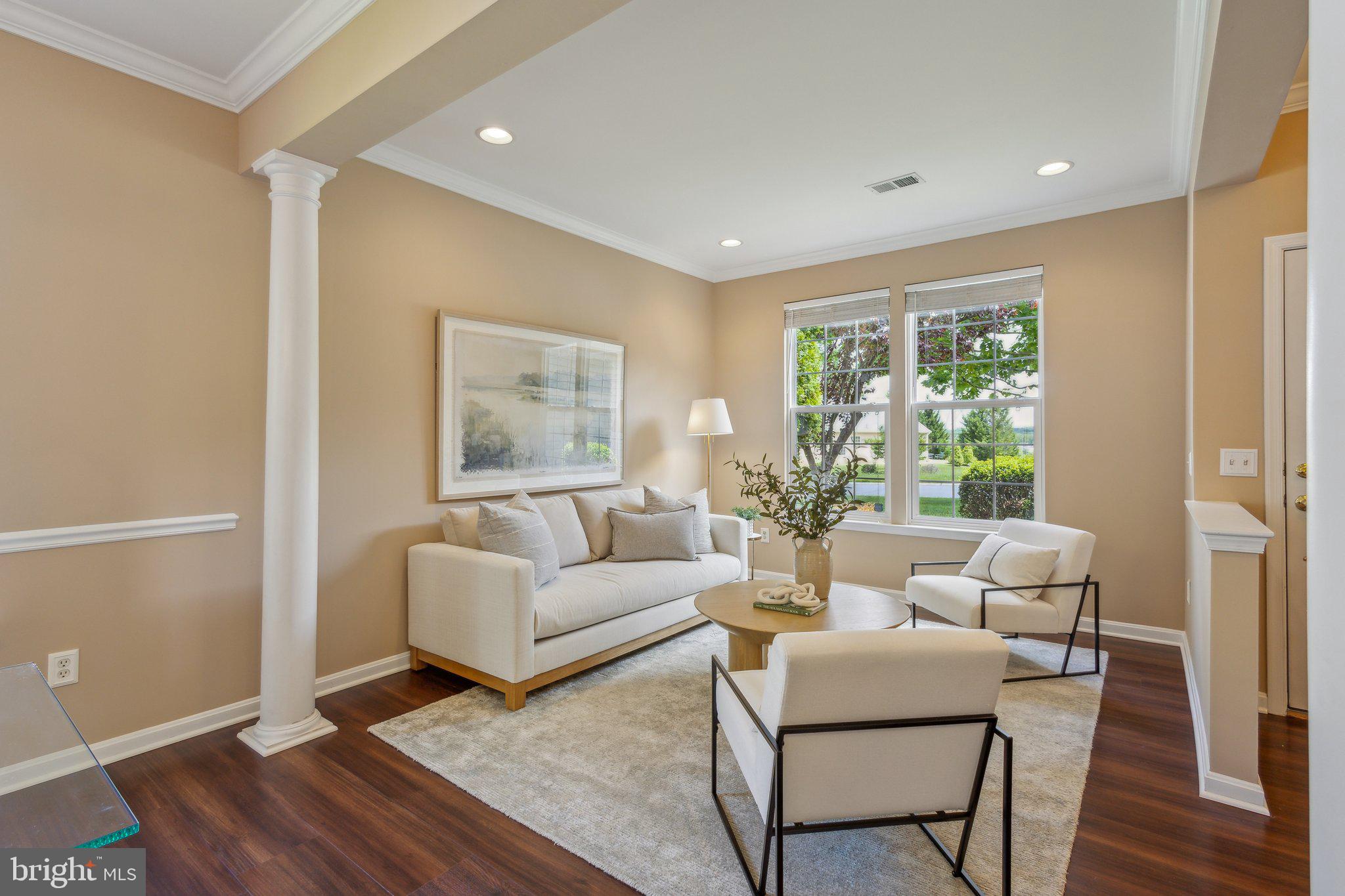 16100 Dancing Leaf Place Dumfries, VA 22025 - Photo 5 of 35 a living room with furniture and a window