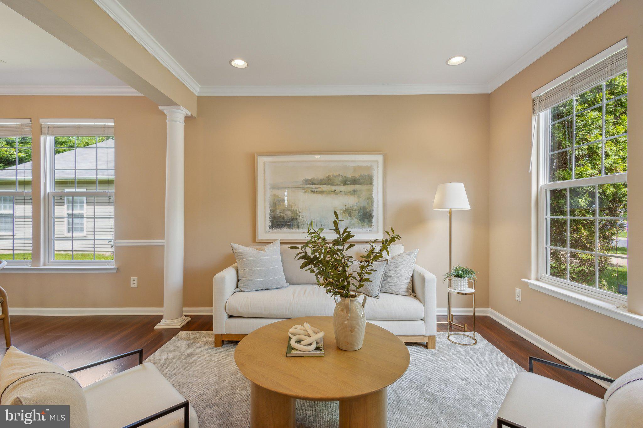 16100 Dancing Leaf Place Dumfries, VA 22025 - Photo 6 of 35 a living room with furniture and a large window