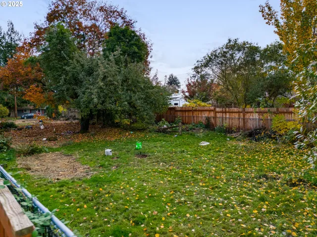 a view of a backyard with a garden