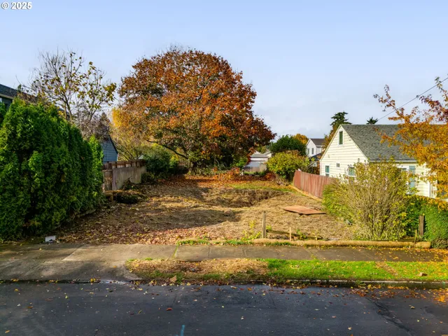 a view of a yard with an outdoor space