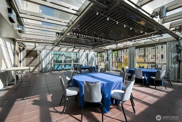 a view of a dining room with furniture window and outside view