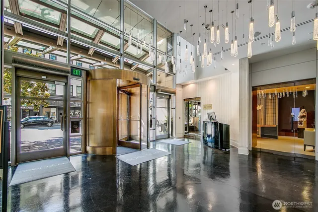 a living room with fireplace furniture and a flat screen tv